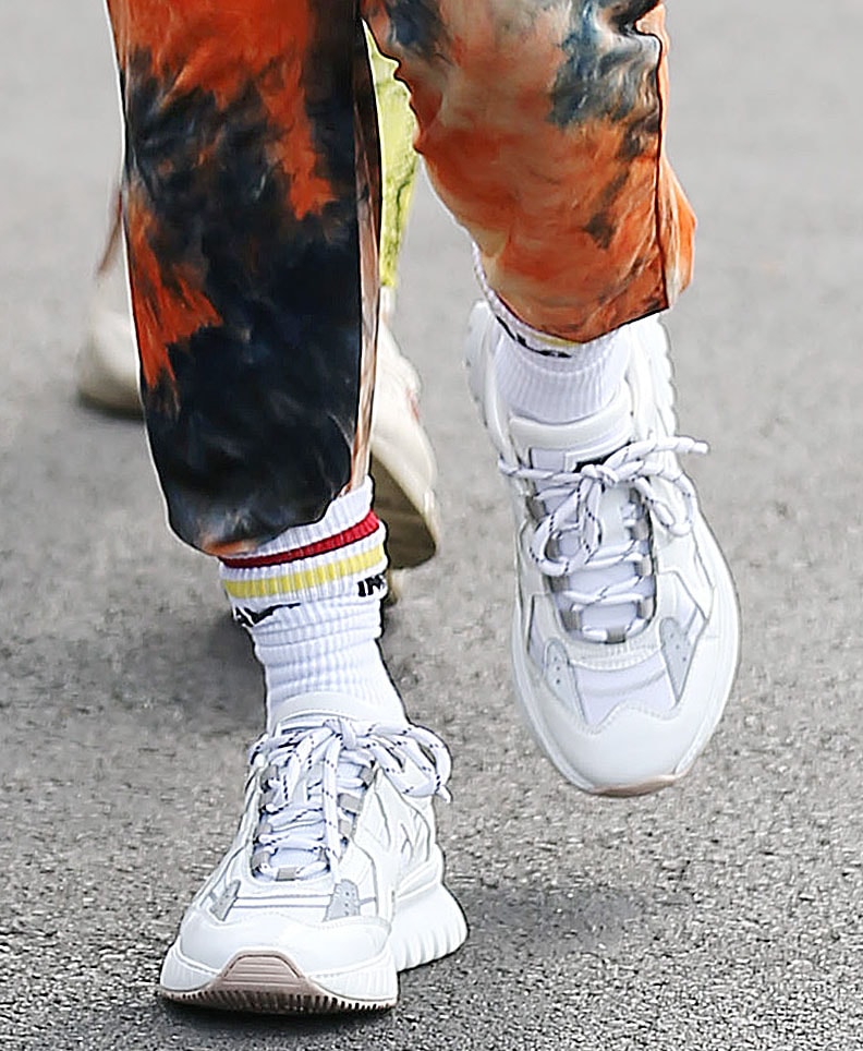 Vanessa Hudgens balances her bright workout look with white Mercer Amsterdam Jupiter shoes