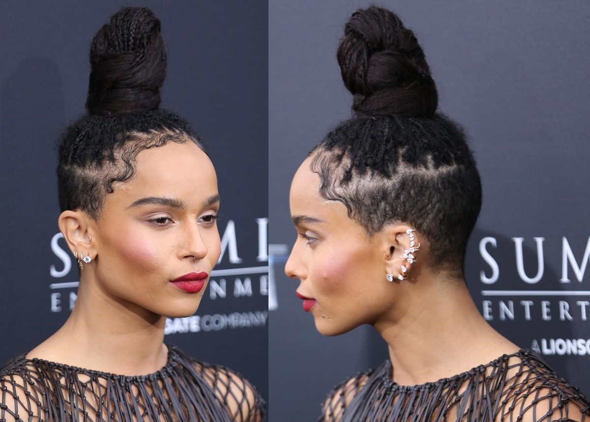 Petite actress Zoë Isabella Kravitz creates the illusion of added height with a sleek, sky-high topknot that elongates her silhouette and draws attention upward