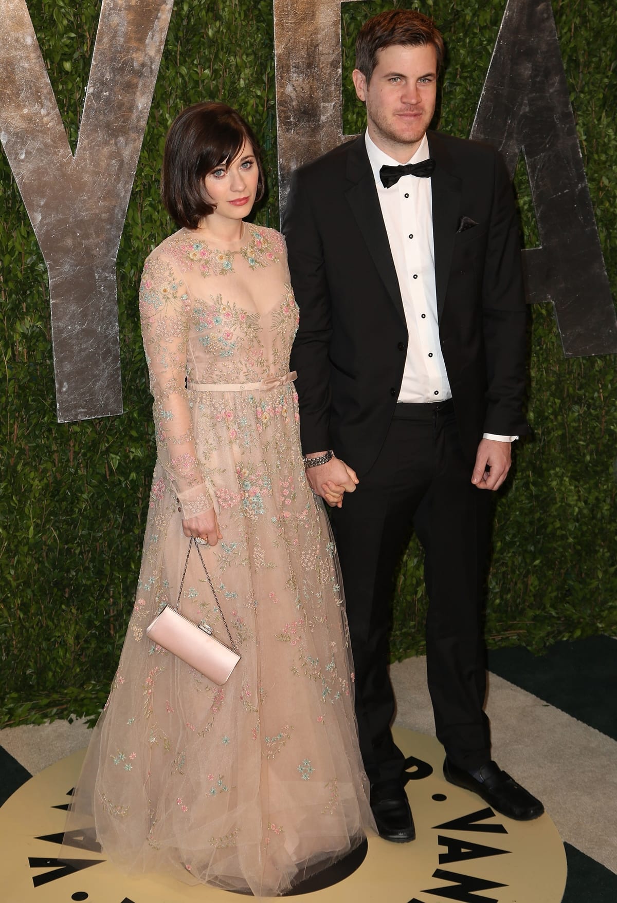 Pictured at the 2013 Vanity Fair Oscar Party, Zooey Deschanel and Jamie Linden were in a relationship between 2012 and 2014