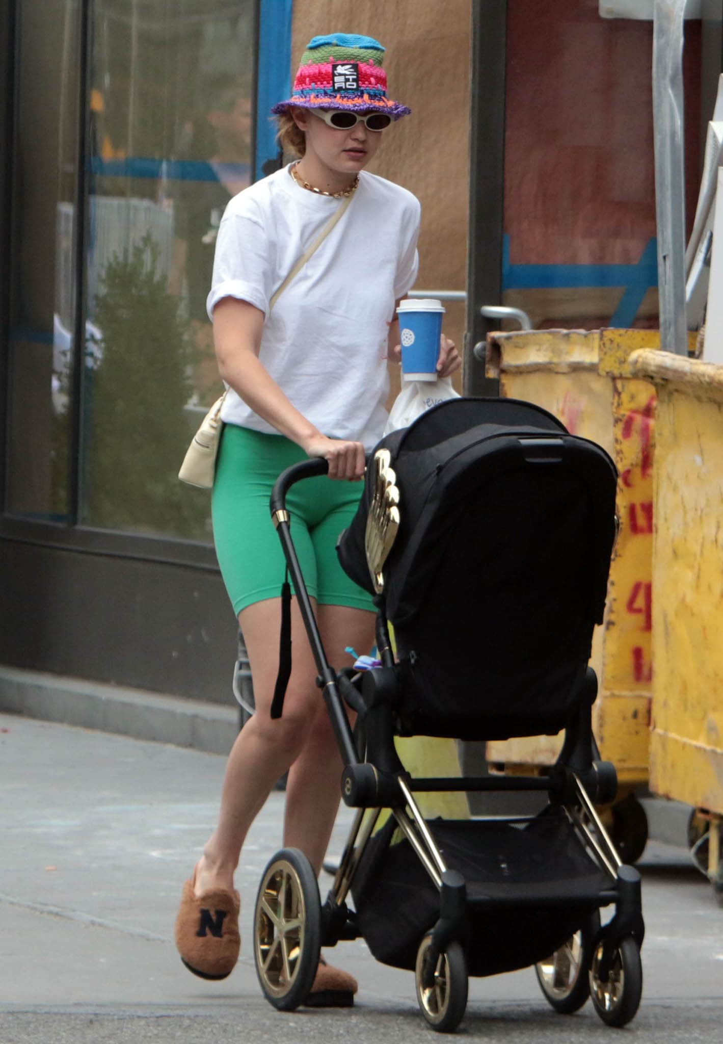 Gigi Hadid strolls around New York City with her daughter Khai on July 29, 2021