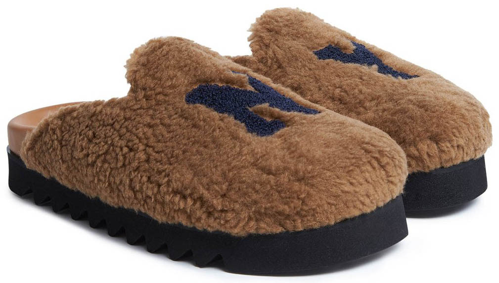 These comfy mules have furry upper with brown calf leather insoles and black rubber soles