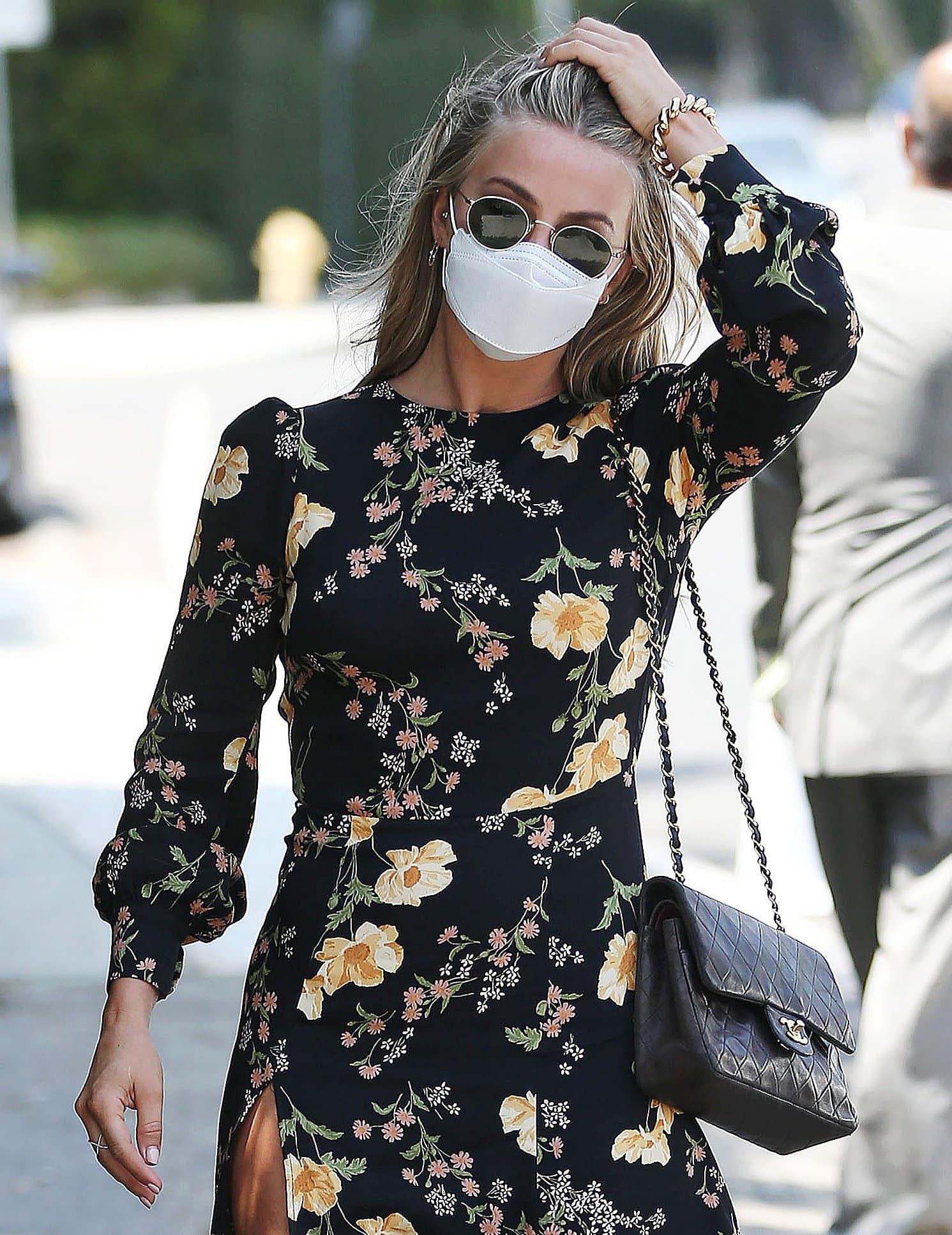 Julianne Hough hides her eyes behind her Celine sunnies and carries a black quilted Chanel bag