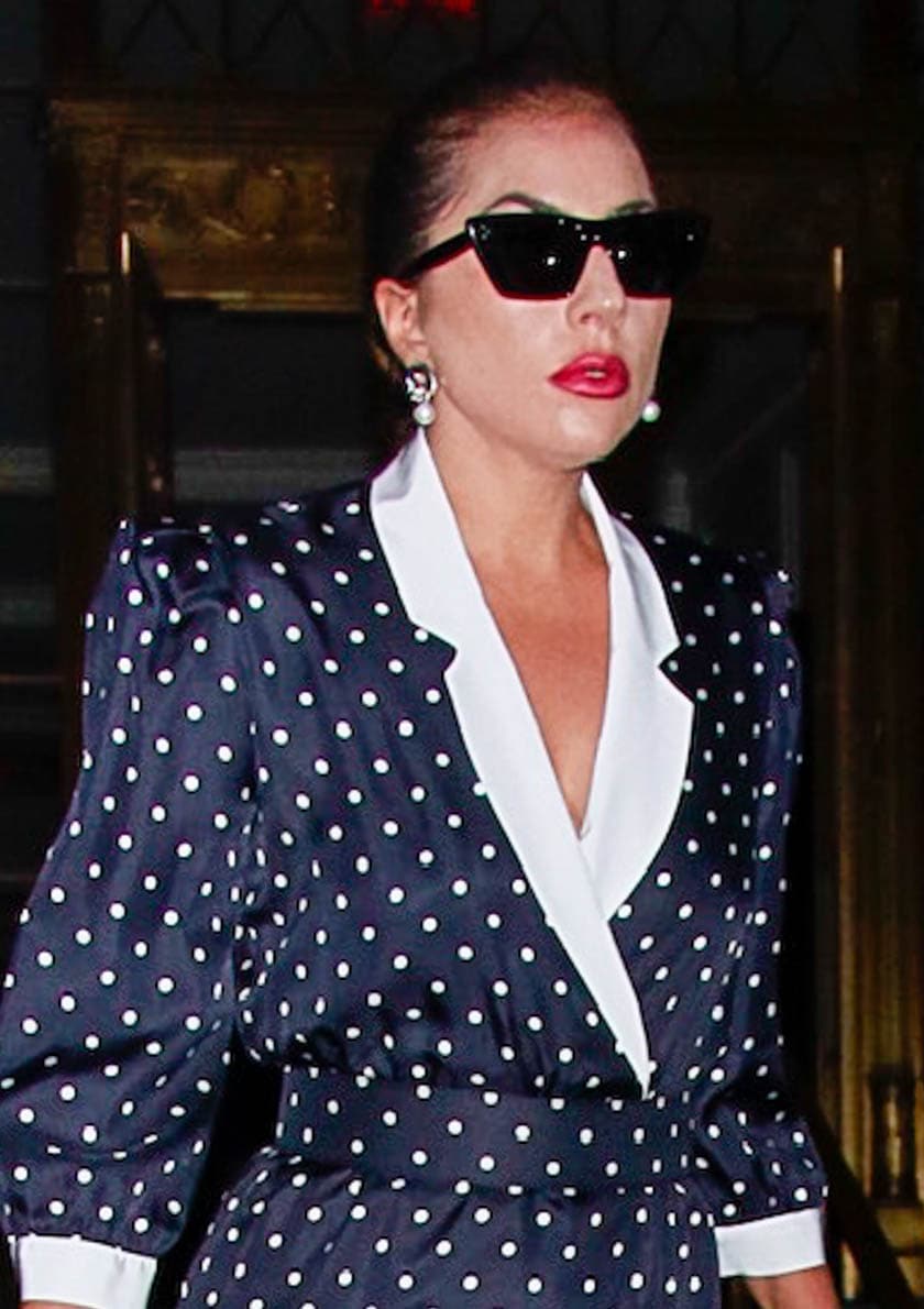 Lady Gaga accessorizes with Agmes Sandra earrings, Edward Avedis ring, and Celine cat-eye sunglasses