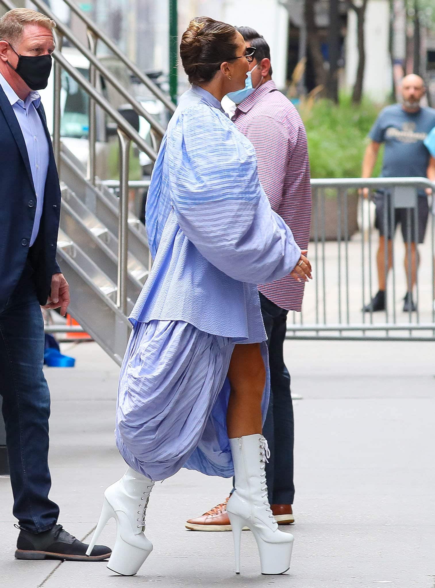 Lady Gaga looks avant-garde in her Loewe periwinkle blue dress with billowing sleeves and a bubble skirt
