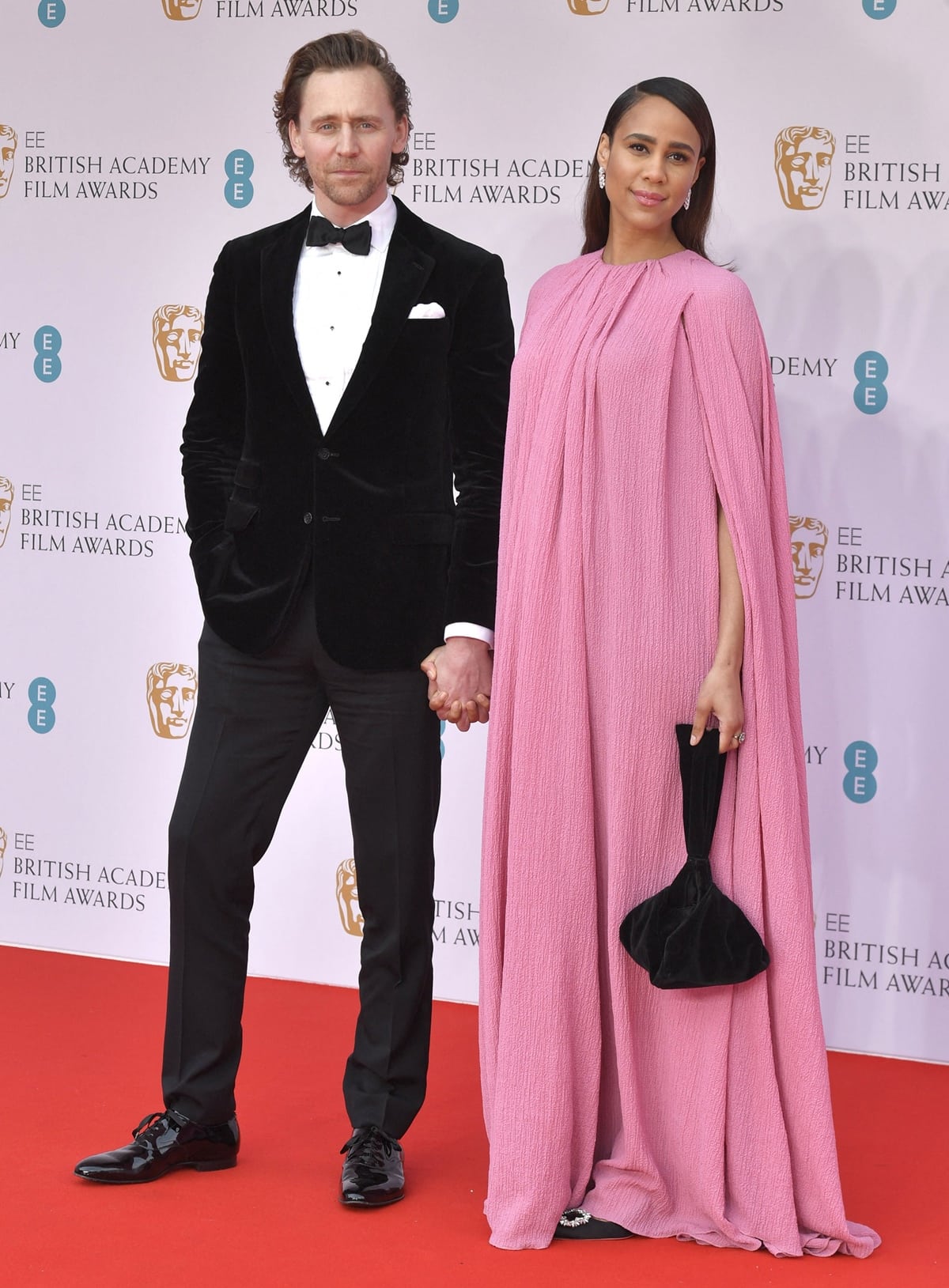 Tom Hiddleston in Ralph Lauren and Zawe Ashton in an Emilia Wickstead dress at the EE British Academy Film Awards 2022 dinner