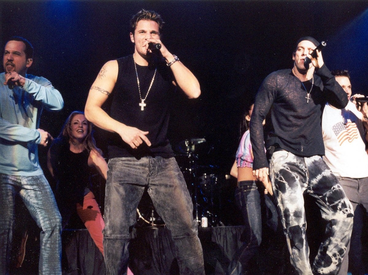 American pop and R&B vocal group 98° consists of Jeff Timmons, brothers Nick and Drew Lachey, and Justin Jeffre