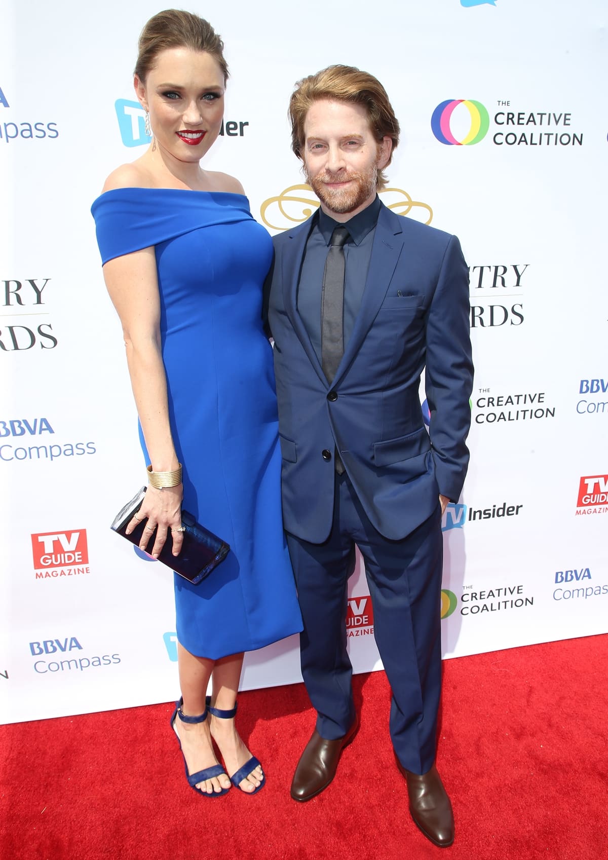 Clare Grant and Seth Green coordinate in striking blue ensembles on the red carpet