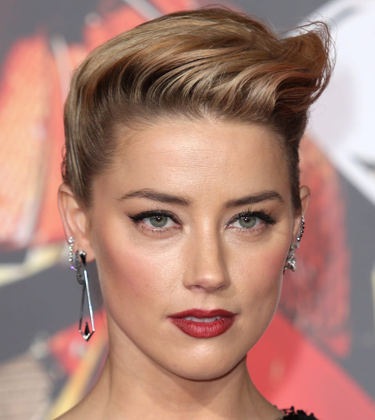 Amber Heard wears Eva Fehren earrings at the premiere of Warner Bros. Pictures' 'Justice League'