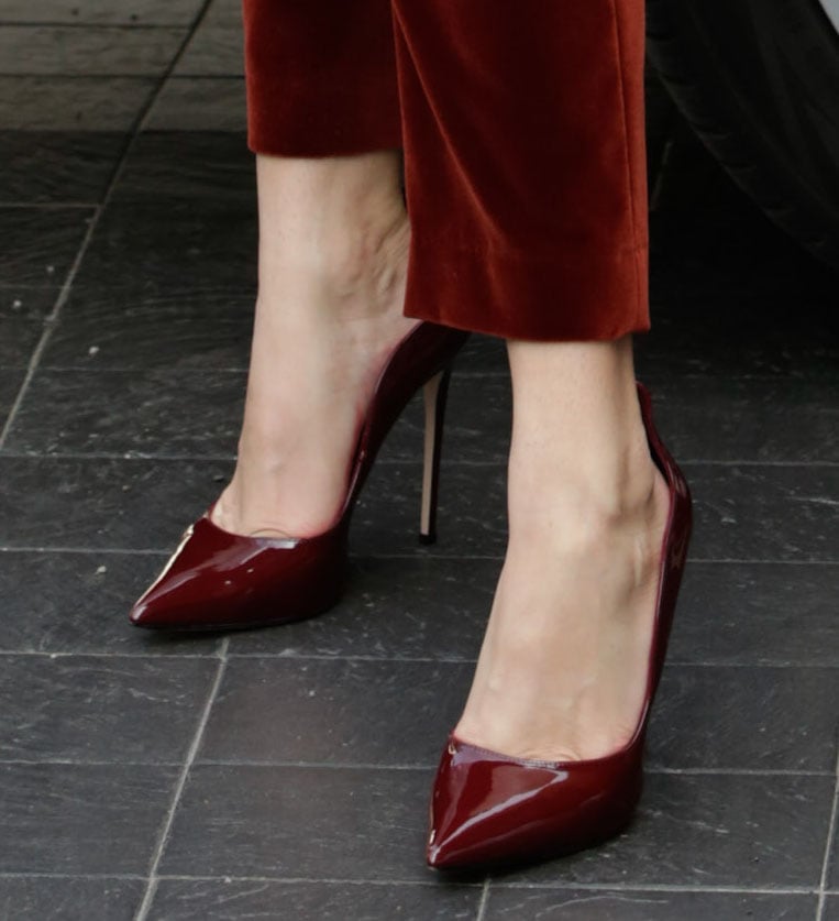 Bella Thorne completes her head-to-toe red look with Le Silla merlot patent pumps