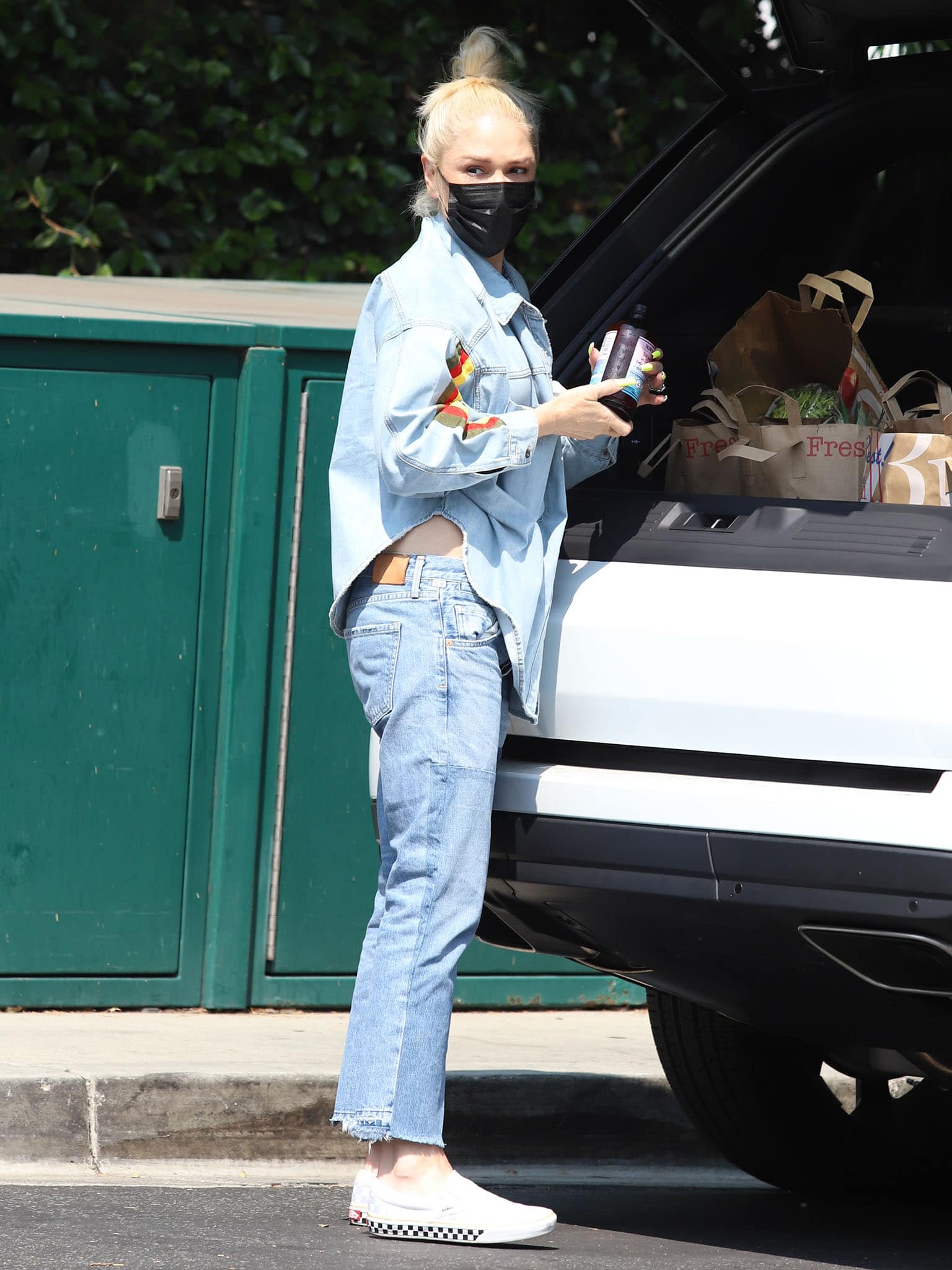 Gwen Stefani embraces Canadian tuxedo in a denim shirt and straight-leg denim jeans