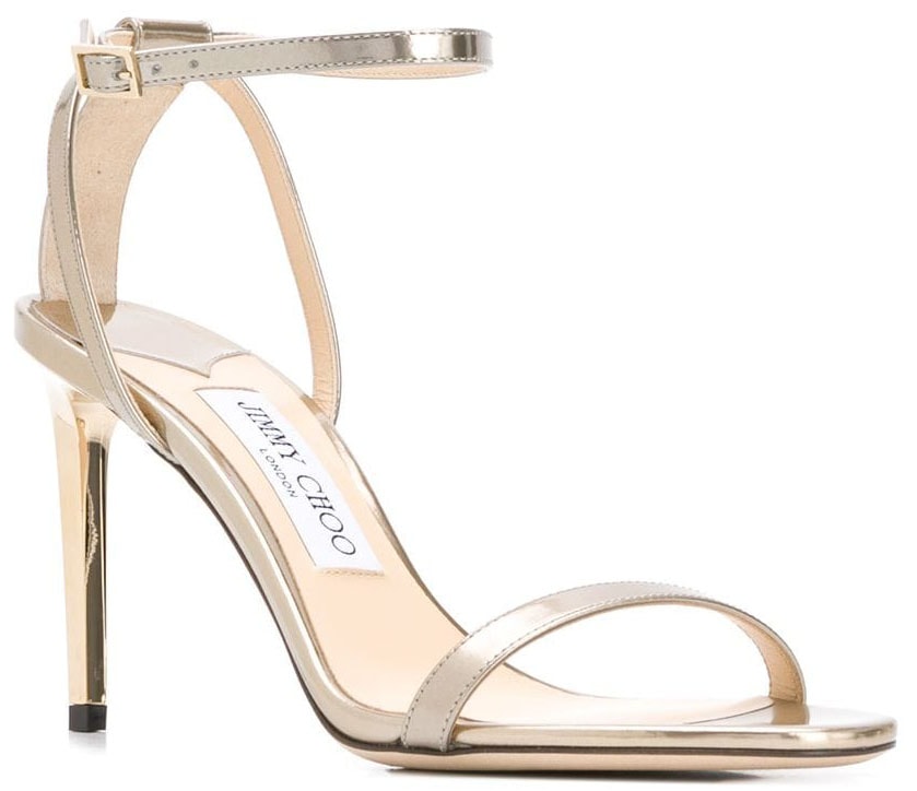 The Jimmy Choo Minny features a classic silhouette with an ankle strap, toe strap, and a stiletto heel