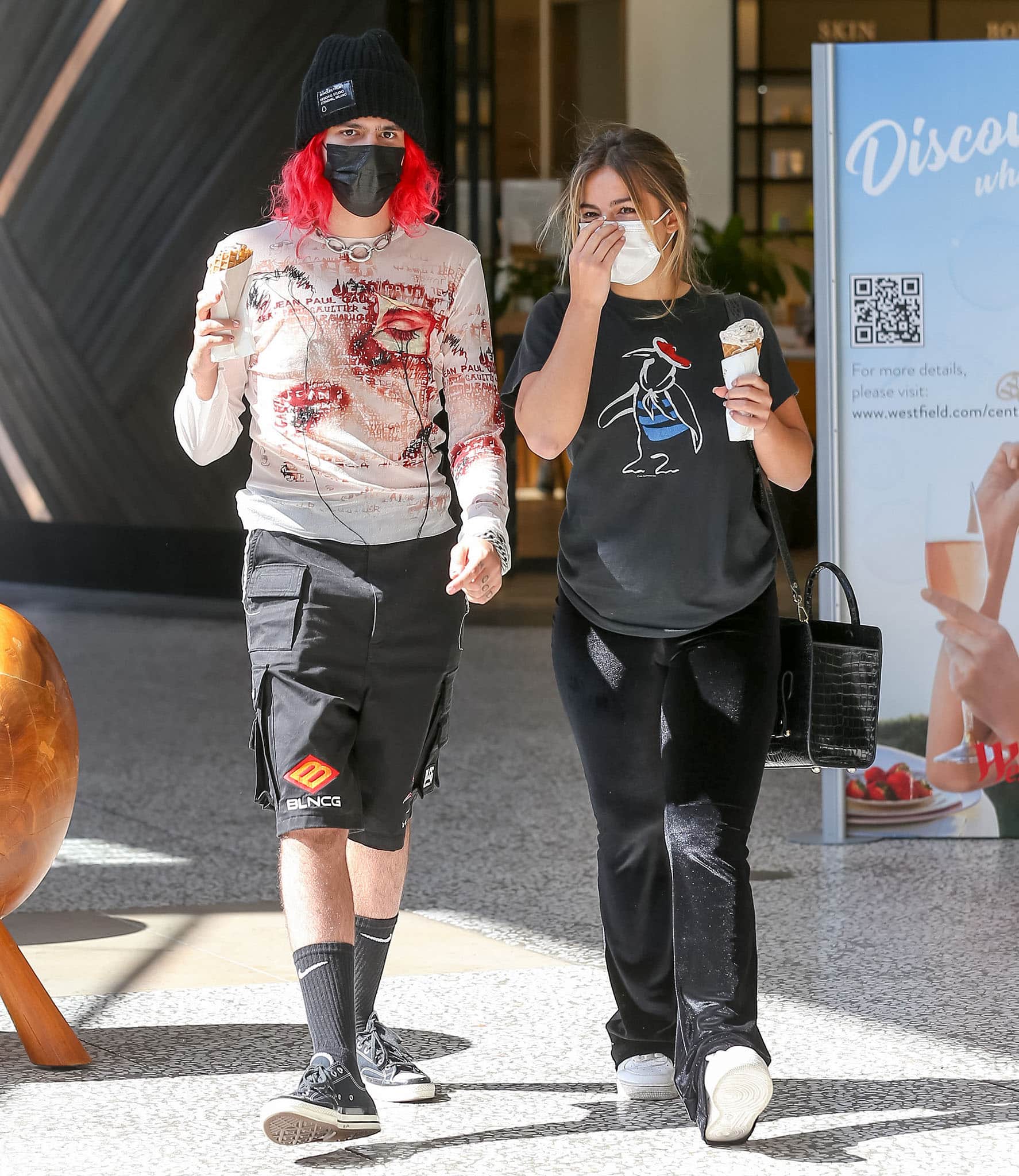 Omer Fedi wears a graphic long-sleeved top with Balenciaga shorts and hides his red hair underneath a Moncler beanie