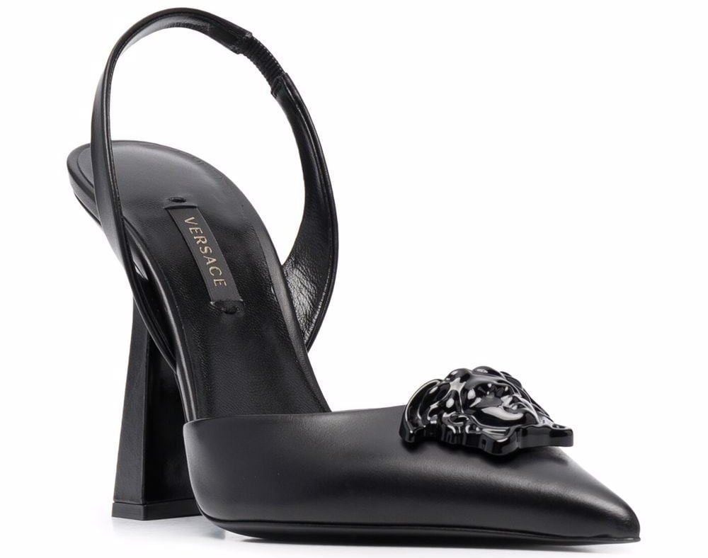 Versace's La Medusa pumps are detailed with a Medusa head plaque and 4.7-inch thick sculpted heels