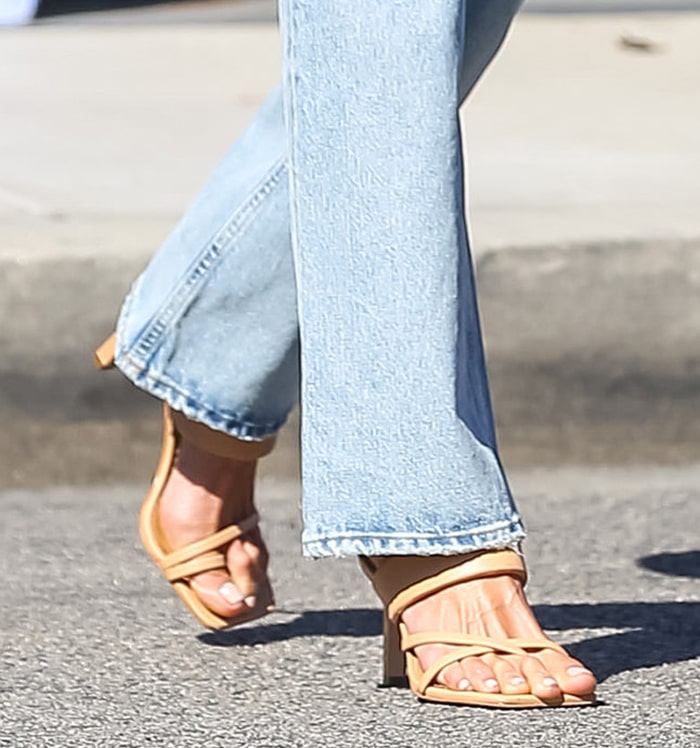 Alessandra Ambrosio shows off her toes in tan toe-ring heels