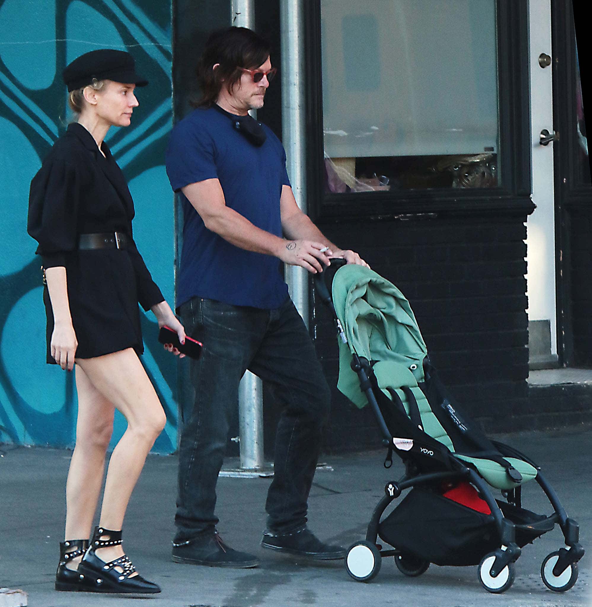 Diane Kruger and Norman Reedus push an empty stroller while out in New York City