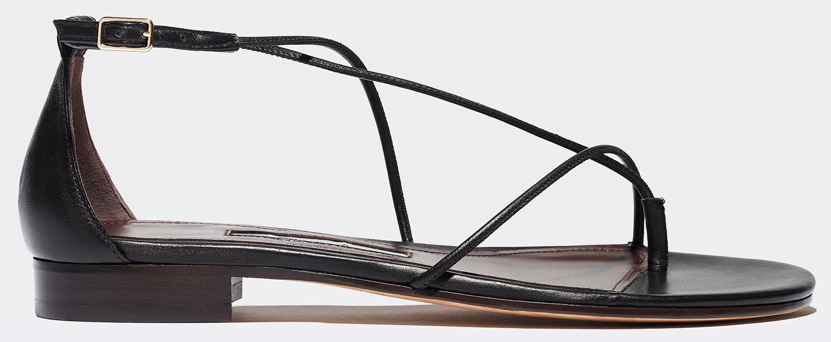 Emme Parsons' String sandal features nappa leather cords that curve asymmetrically around the instep