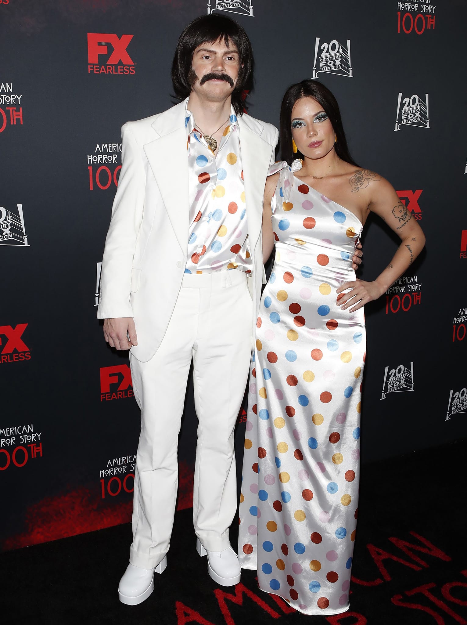 Evan Peters and Halsey dressed as Sonny and Cher at FX’s American Horror Story 100th Episode Celebration Halloween party on October 26, 2019