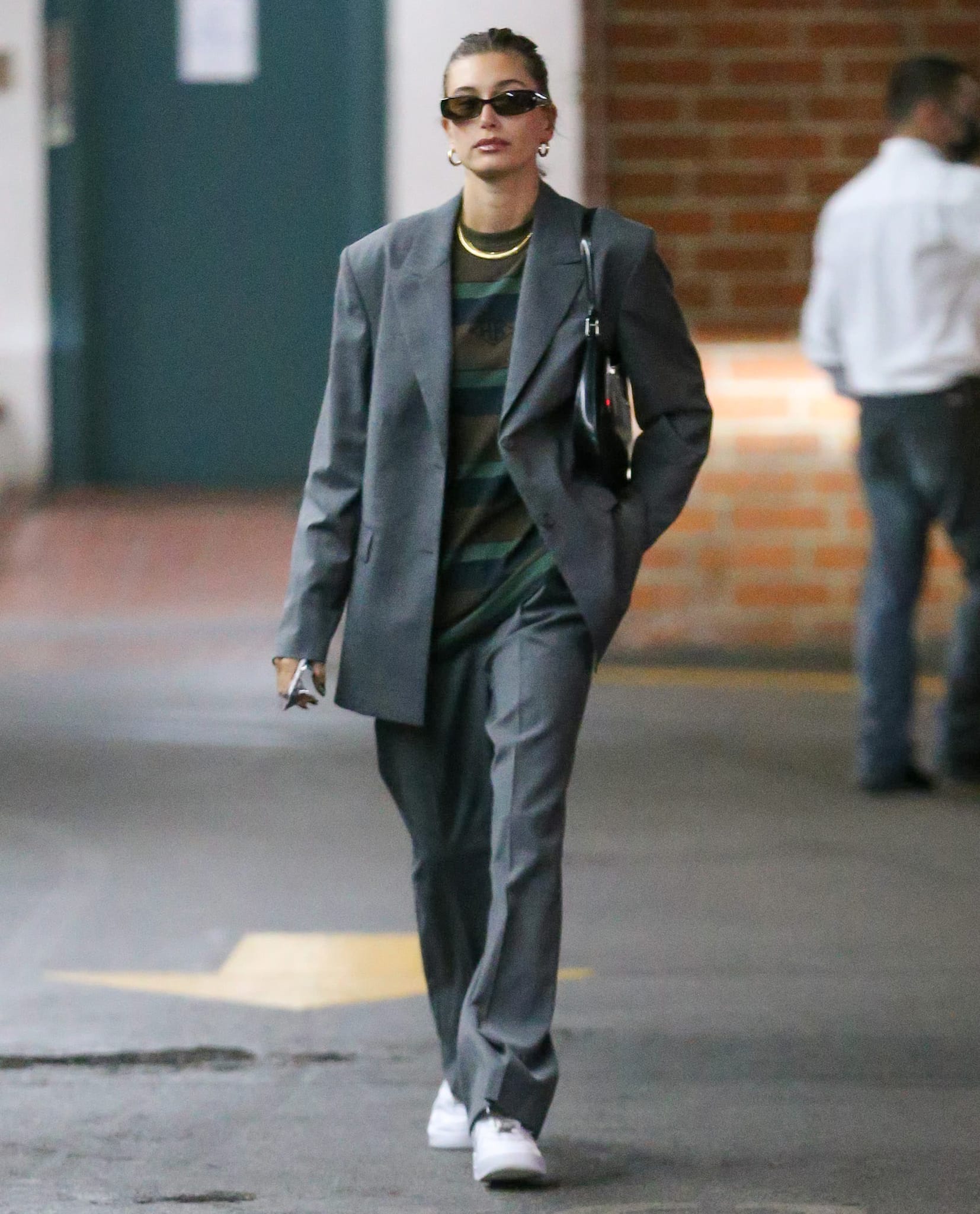 Hailey Bieber goes for androgynous chic while leaving a medical building in Beverly Hills on October 19, 2021