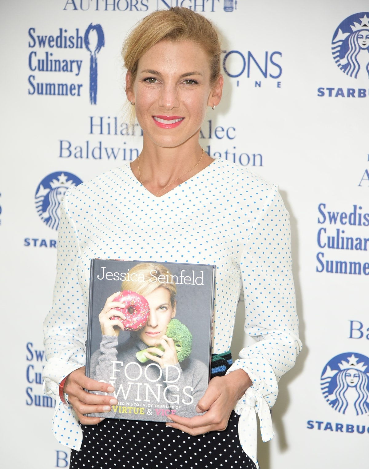 Holding a copy of her book Food Swings: 125+ Recipes to Enjoy Your Life of Virtue & Vice: A Cookbook, Jessica Seinfeld was accused by cookbook author Missy Chase Lapine of stealing her idea for a book