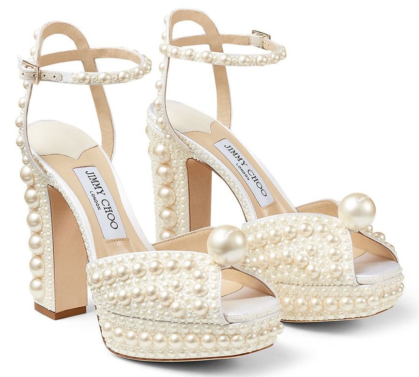 The Jimmy Choo Sacaria embraces maximalist glamour with all-over pearl embellishments