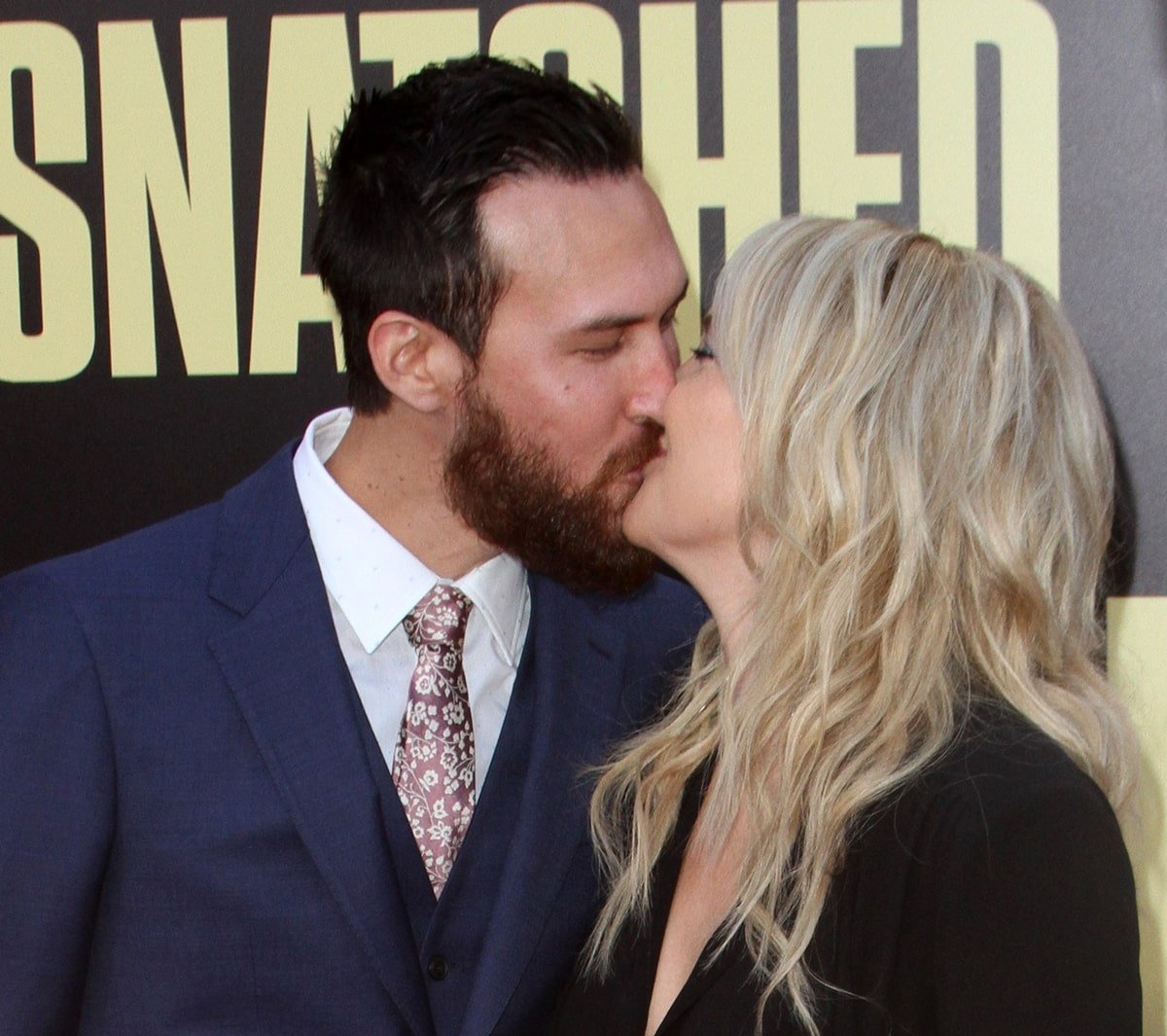 Kate Hudson kissing her longtime boyfriend Danny Fujikawa