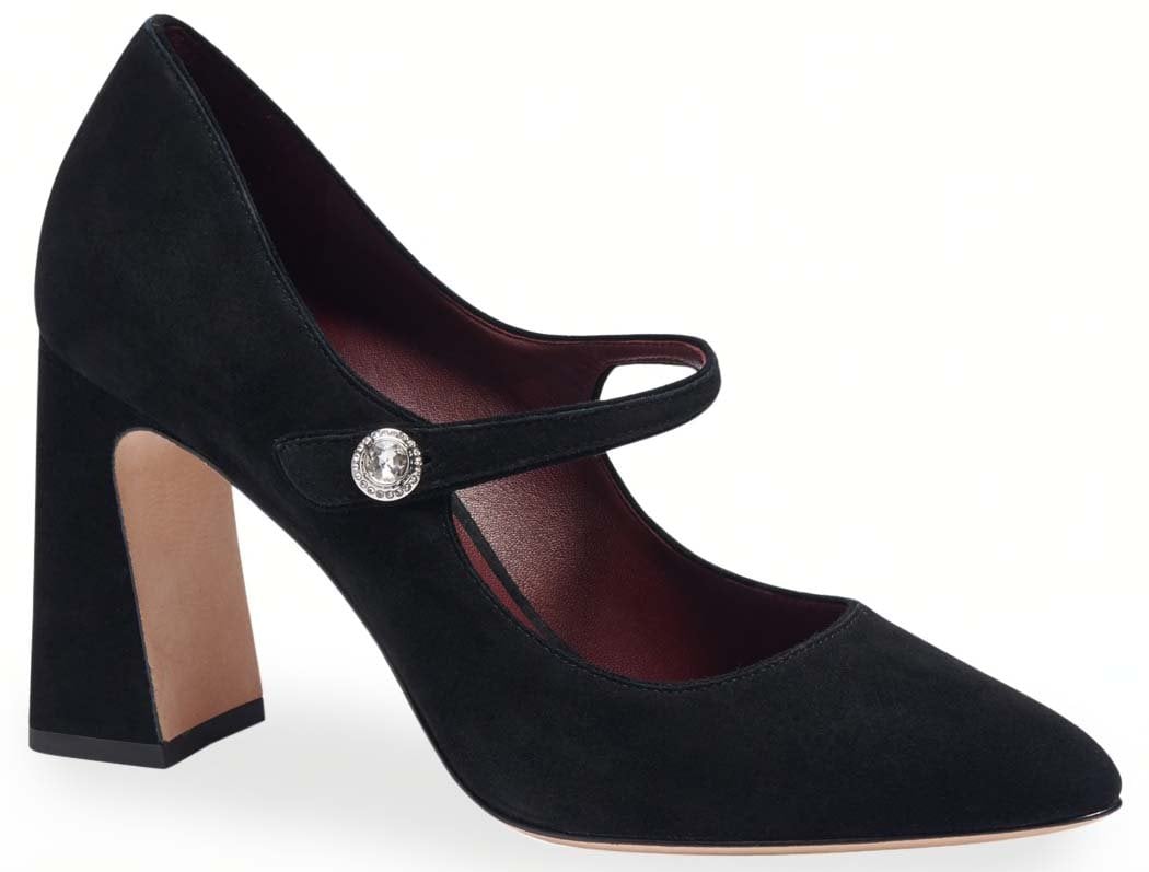 A contemporary pair of Mary Jane pumps with a crystal button and a high block heel