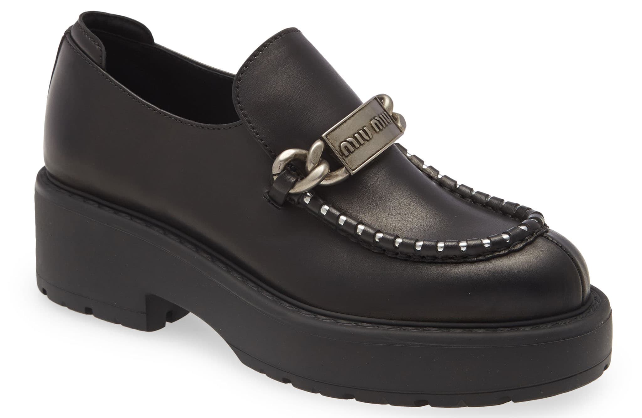 Logo-embossed bit hardware brands this contemporary Miu Miu loafer boosted by a chunky platform