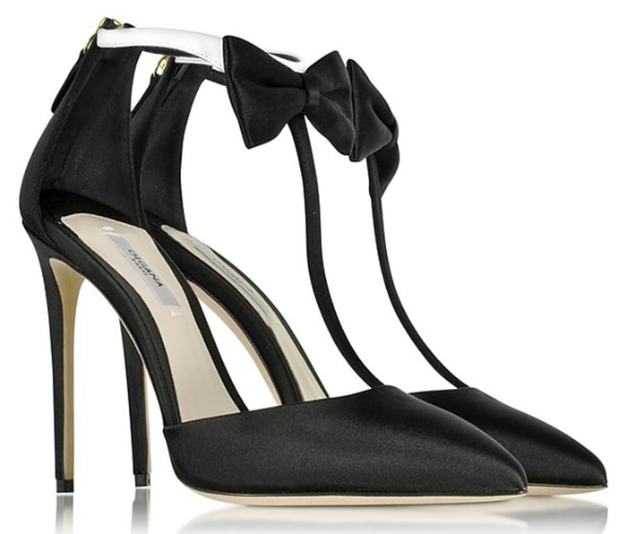 The La Garconne pumps feature a tuxedo-inspired ankle strap complete with bow detail on the t-bar strap