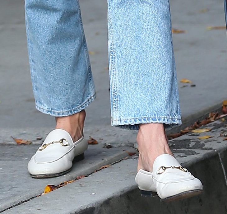 Alessandra Ambrosio pairs her casual outfit with Gucci Brixton loafers