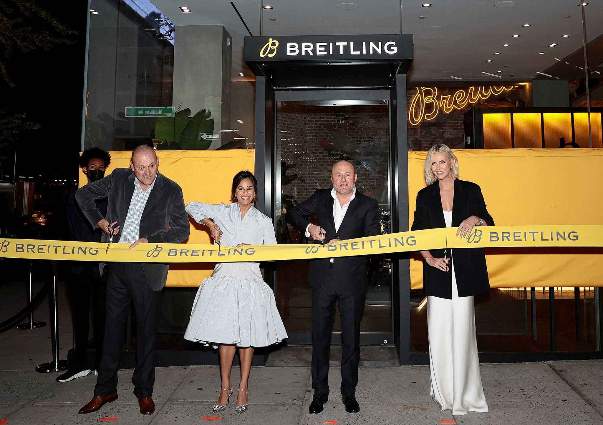 USA President for Breitling Thierry Prissert, Misty Copeland, CEO for Breitling Georges Kern, and Charlize Theron attend the Breitling Madison Avenue Grand Opening