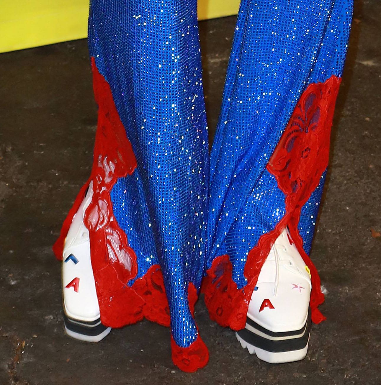 Kate Hudson pairs her sparkly retro outfit with Stella McCartney Elyse platform sneakers
