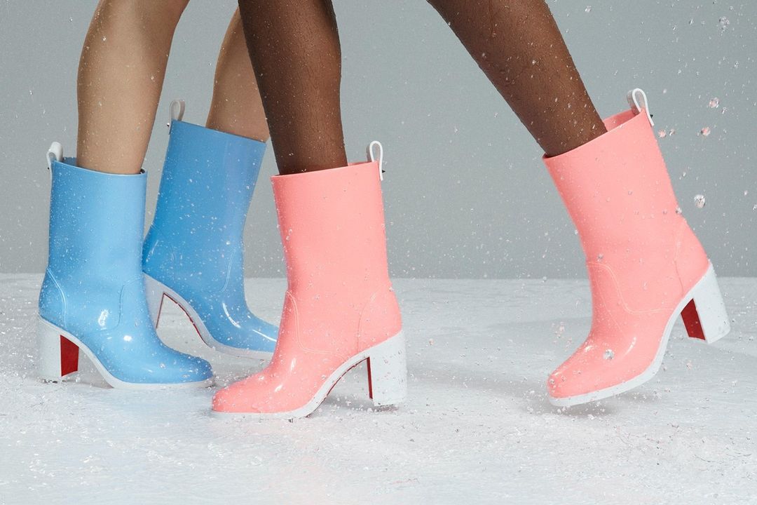 Stay stylish in rainy weather with Christian Louboutin's waterproof Loubirain rain boots elevated by a block heel and a red logo-debossed inset at the sole