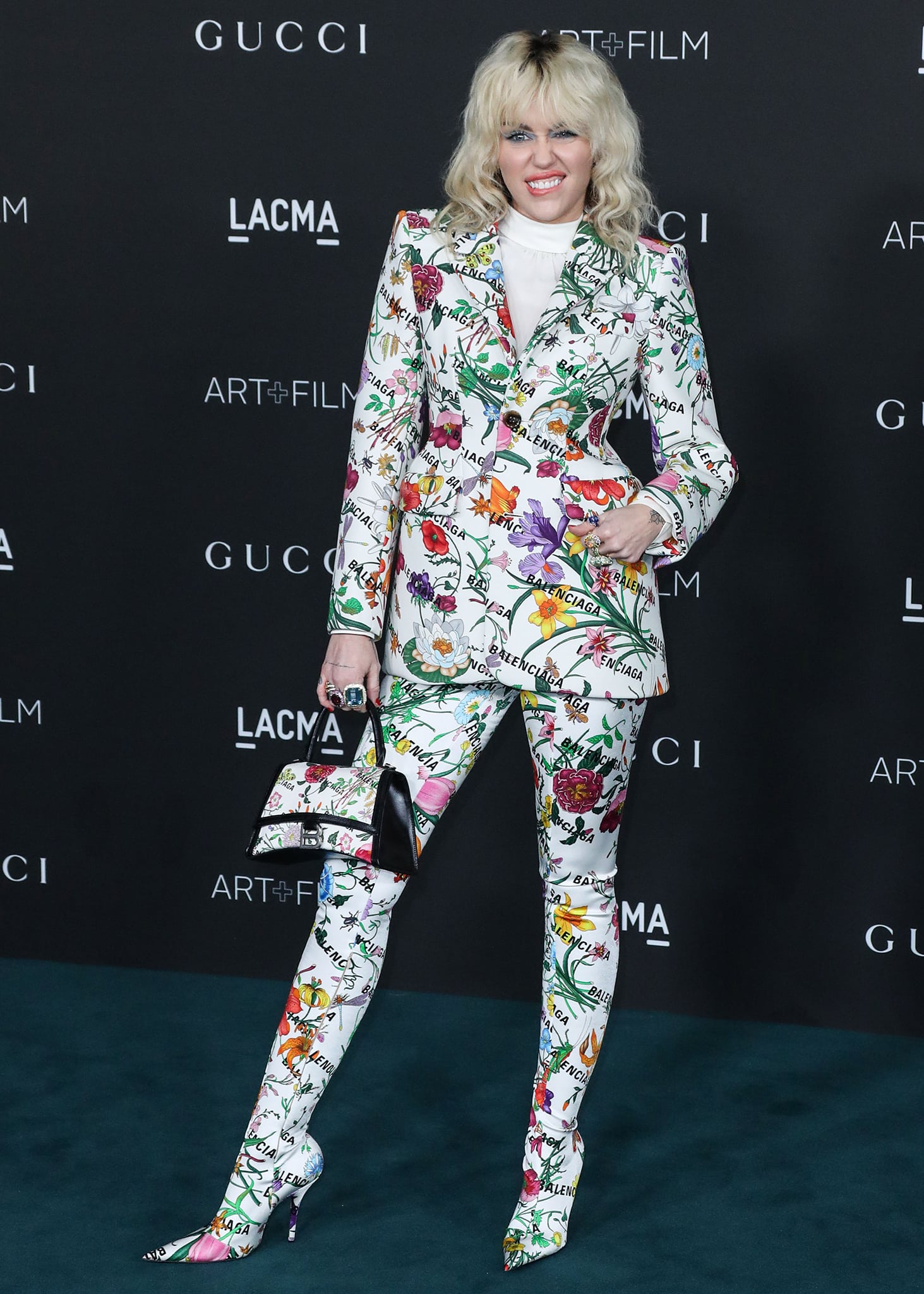 Miley Cyrus turns heads in a Gucci x Balenciaga hybrid look from Gucci's Fall 2021 collection