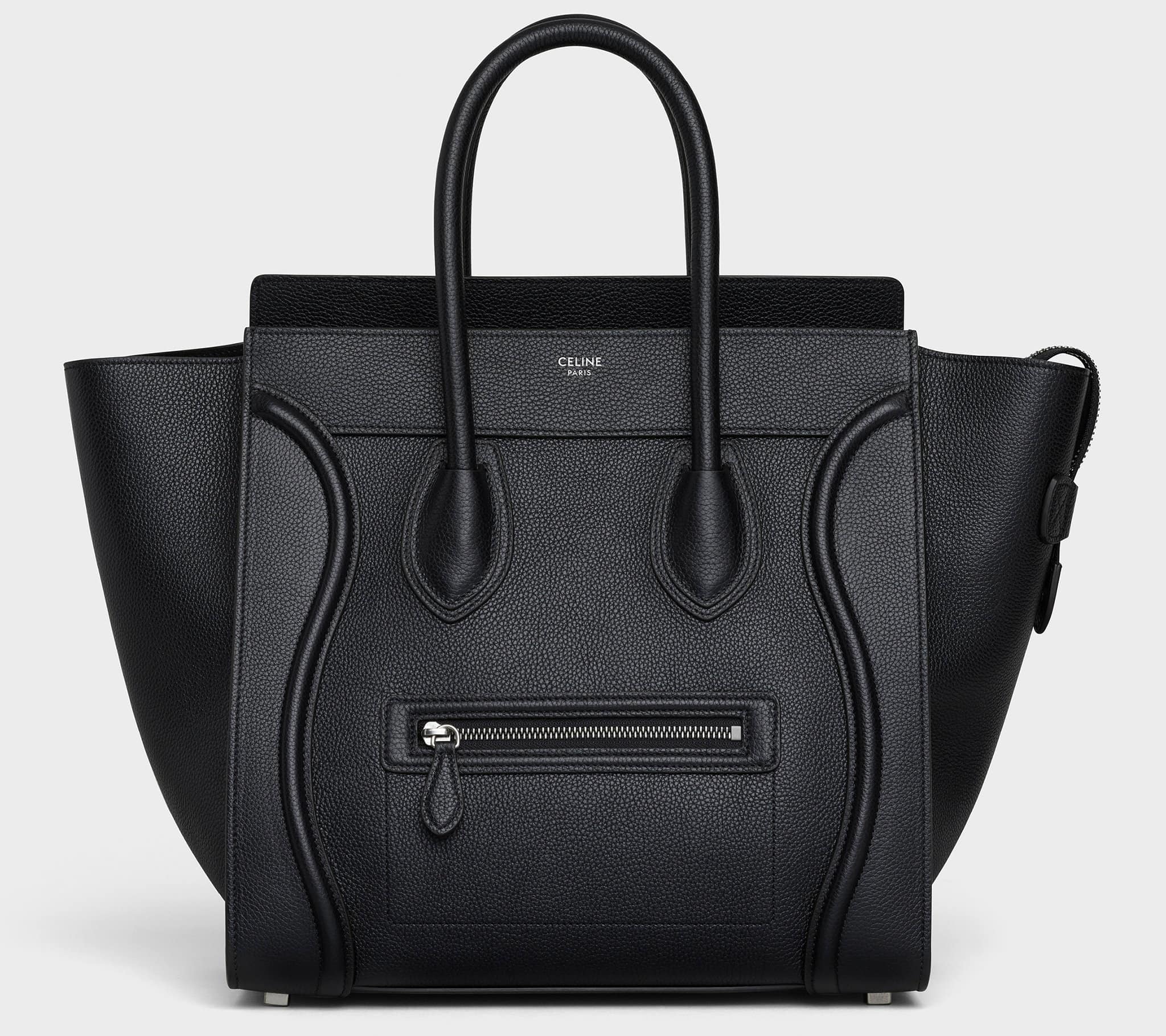 A celebrity-favorite, this popular Celine Luggage bag is crafted from drummed calfskin leather and features leather handles and a front zipped pocket