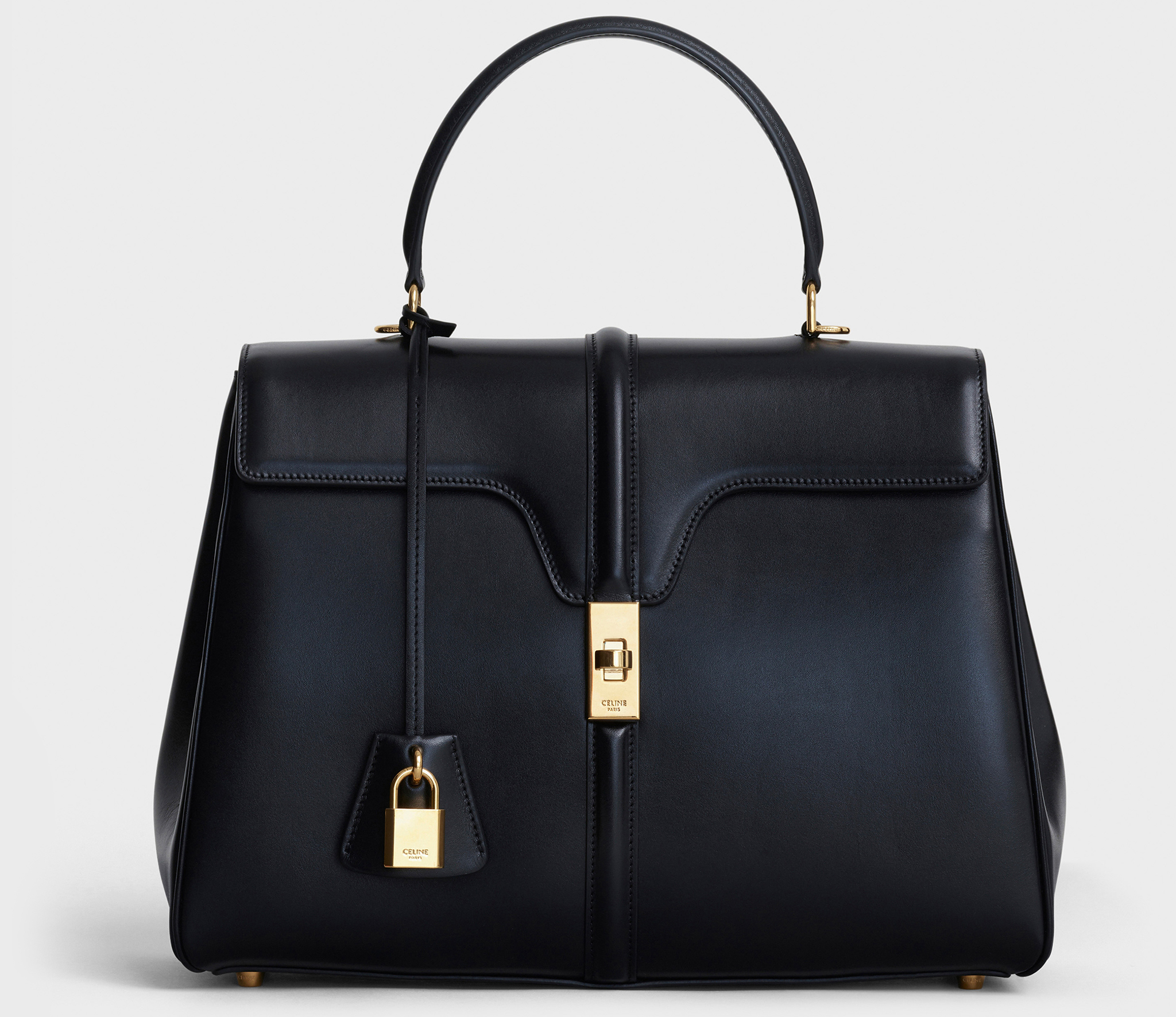 A classic bag made of satinated calfskin leather, the Celine 16 has a removable shoulder strap, a top handle and a twist-lock closure on the flap