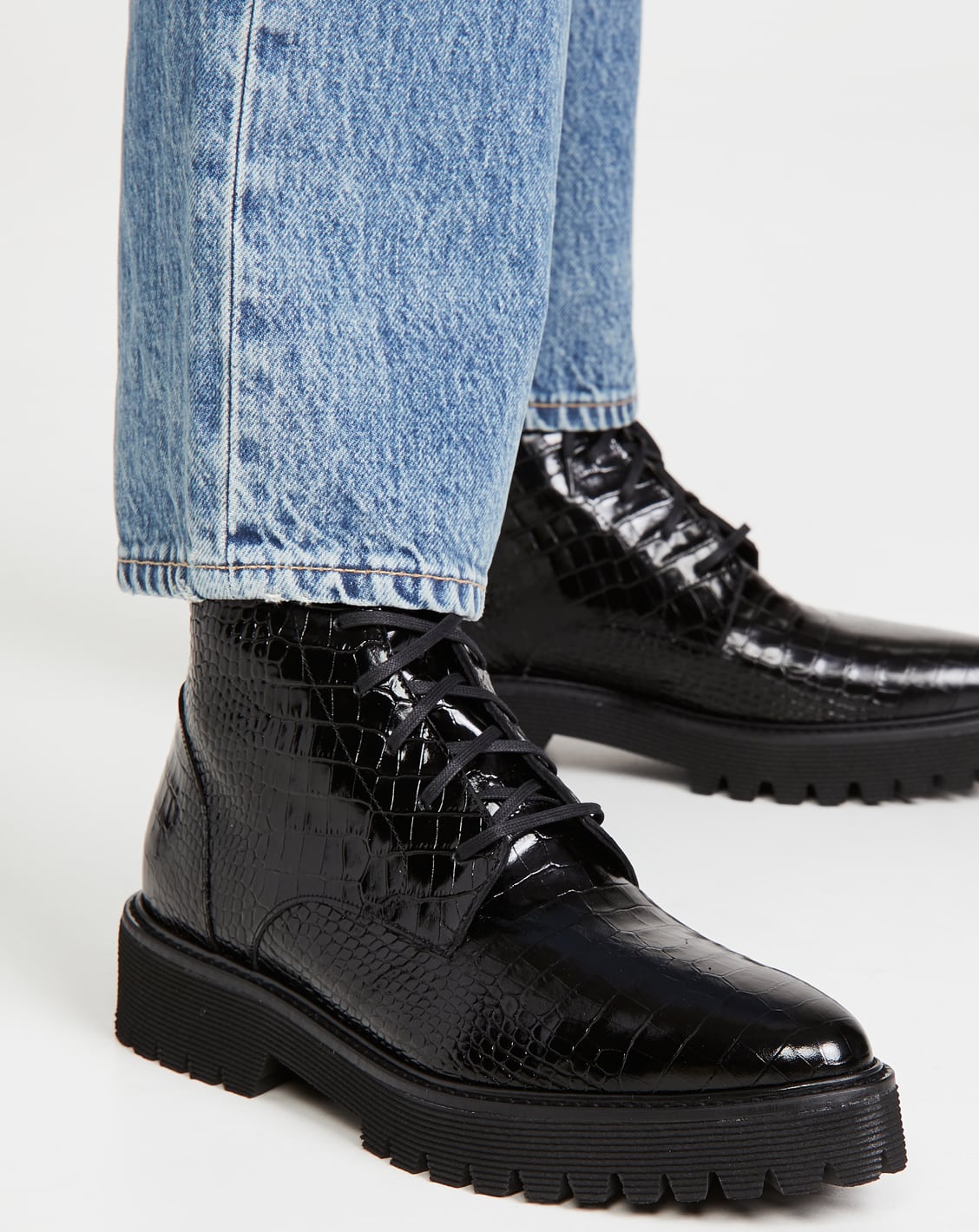 The Emi boot from California-based brand Freda Salvador features a croc-effect leather upper and a rubber lug sole