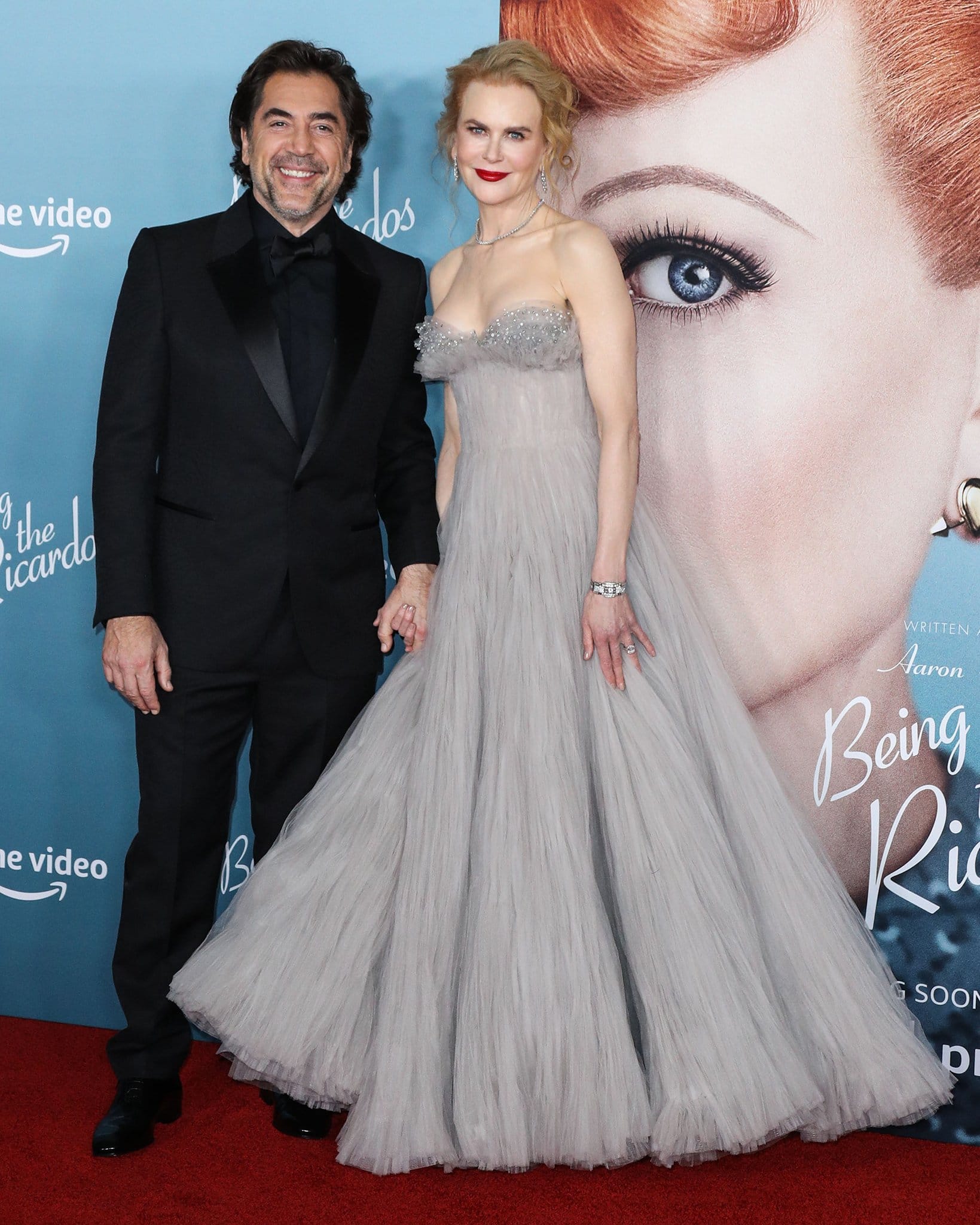Nicole Kidman holds hands with on-screen husband Javier Bardem on the red carpet
