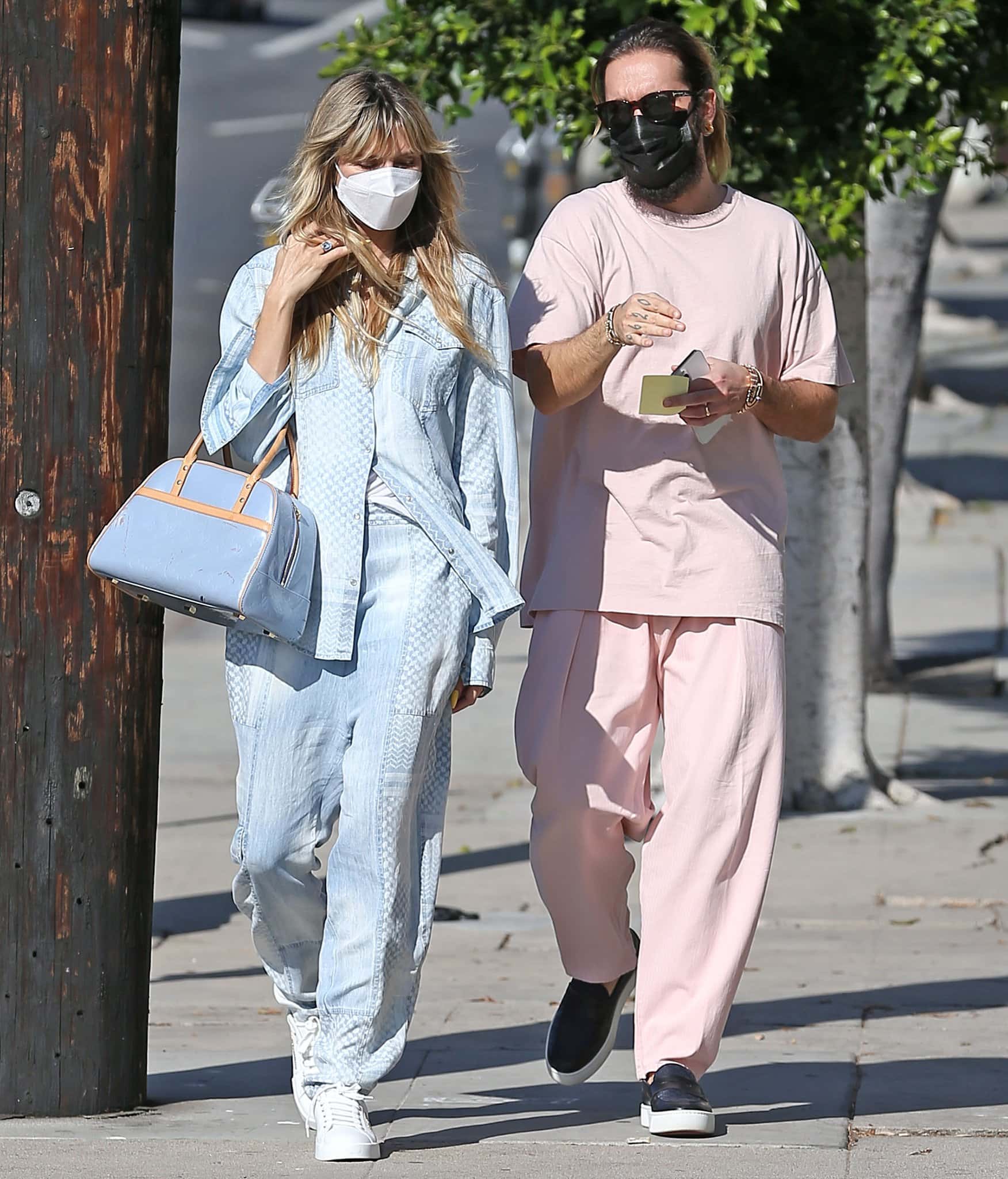 Heidi Klum and Tom Kaulitz shop for furniture in clashing blue and pink outfits on November 24, 2021