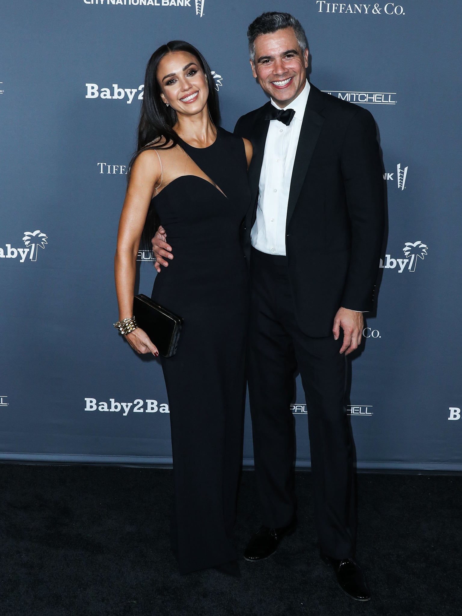 Jessica Alba and Cash Warren pose together at the Baby2Baby 10th Anniversary Gala on November 13, 2021