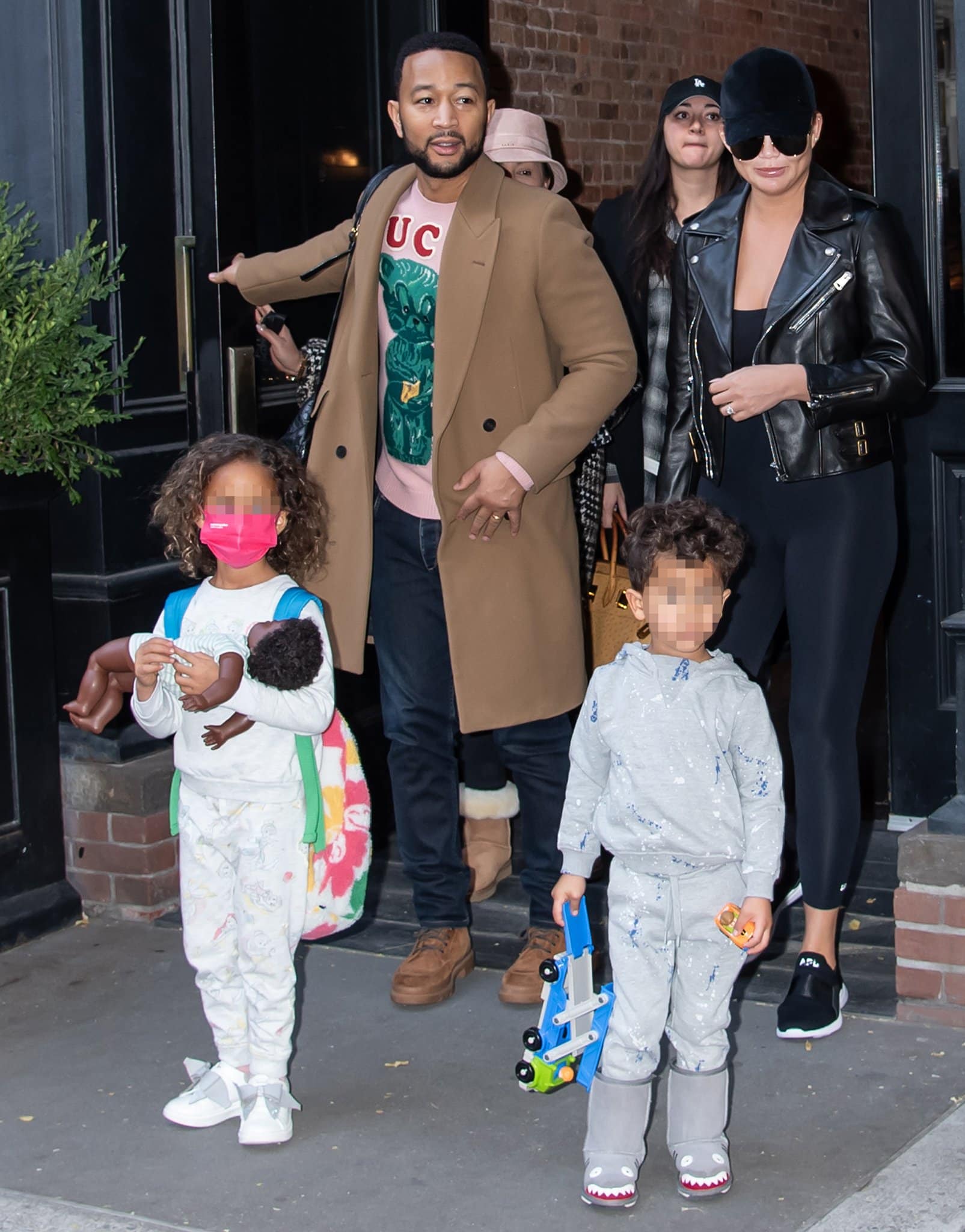 John Legend, Chrissy Teigen, and their kids head to the airport in New York City