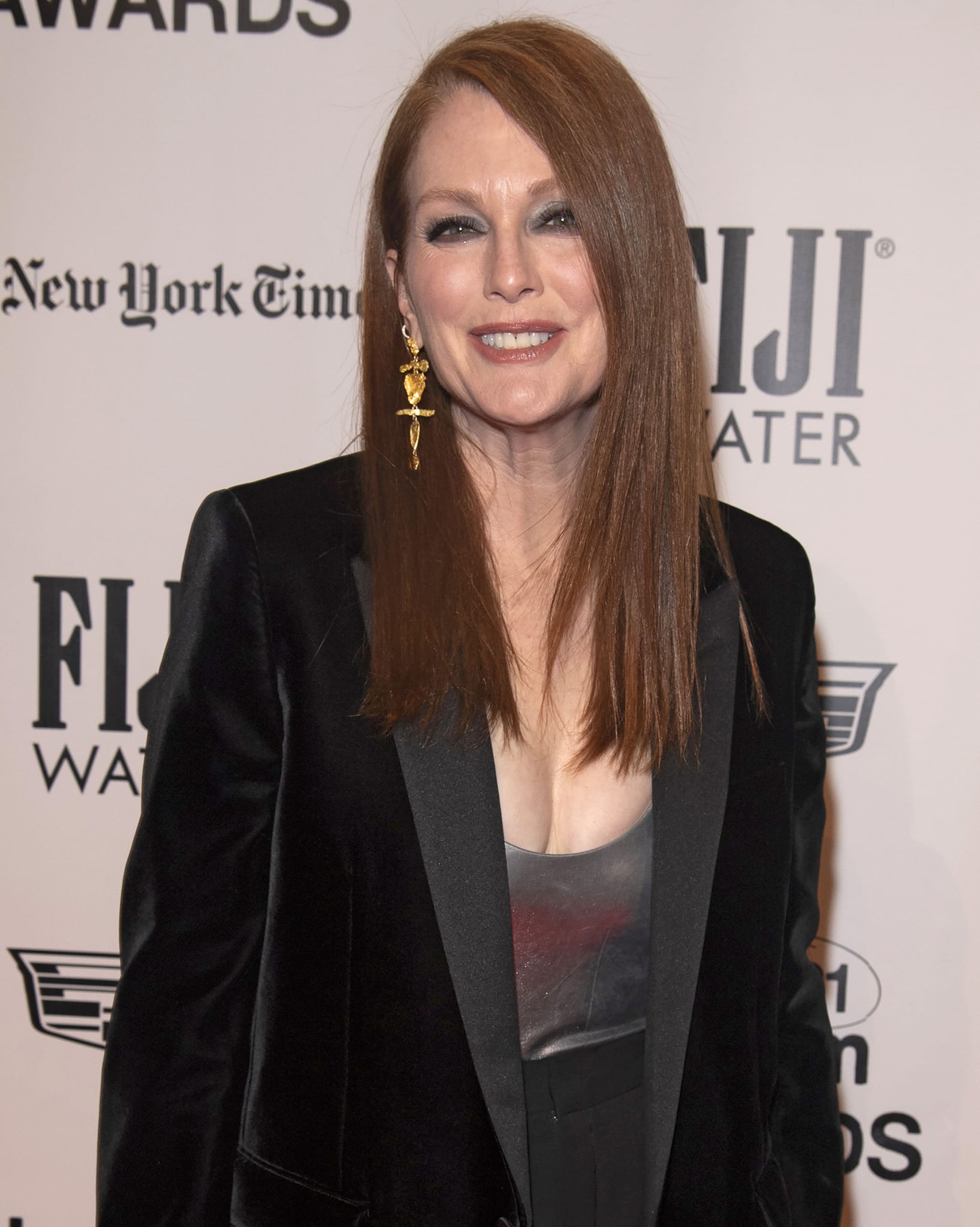 Julianne Moore styles her hair sleek straight and wears smokey eyeshadow