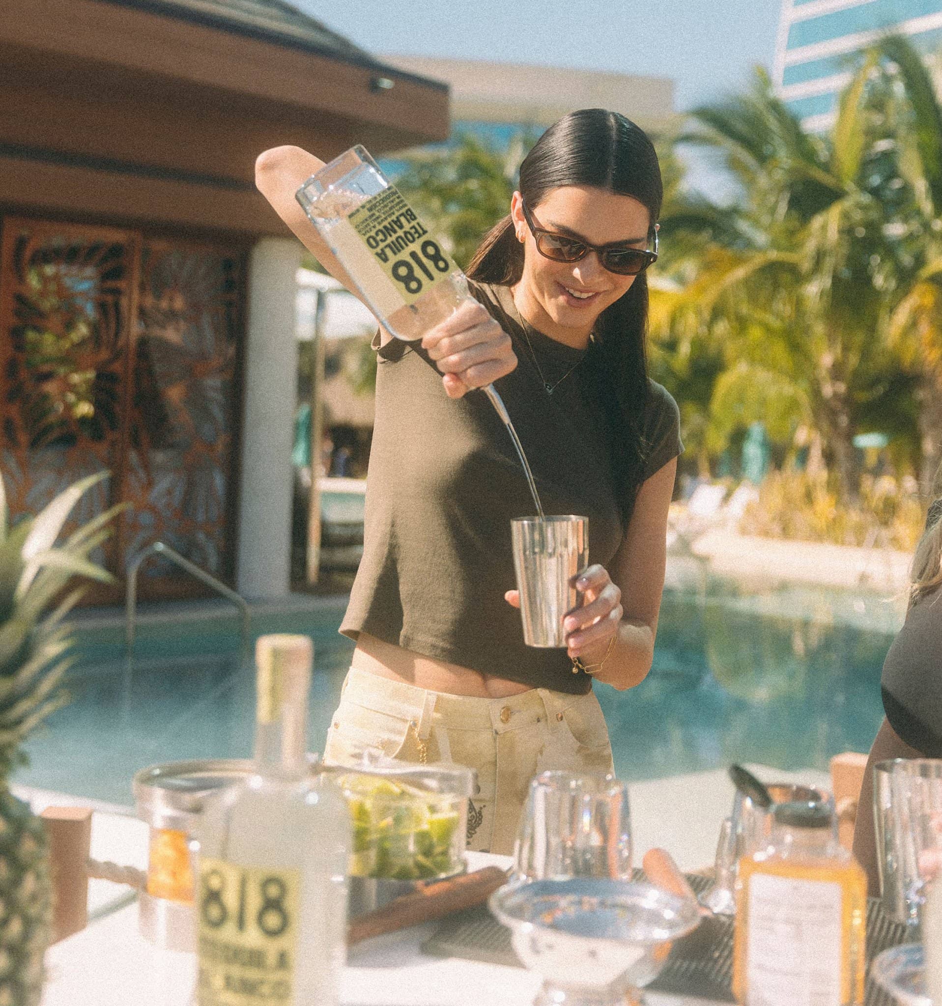 Kendall Jenner mixes 818 Tequila cocktails at Seminole Hard Rock Hotel & Casino in Florida on December 7, 2021