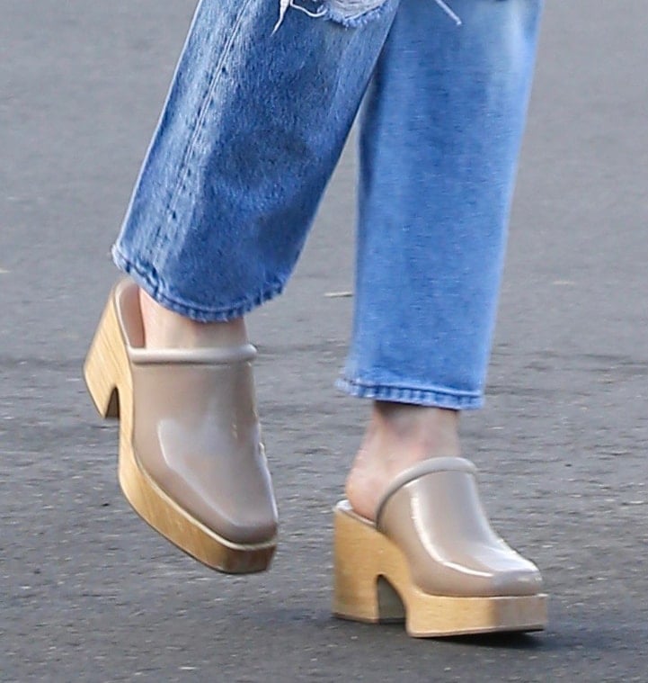 Lucy Hale completes her casual-chic winter look with Rachel Comey clogs