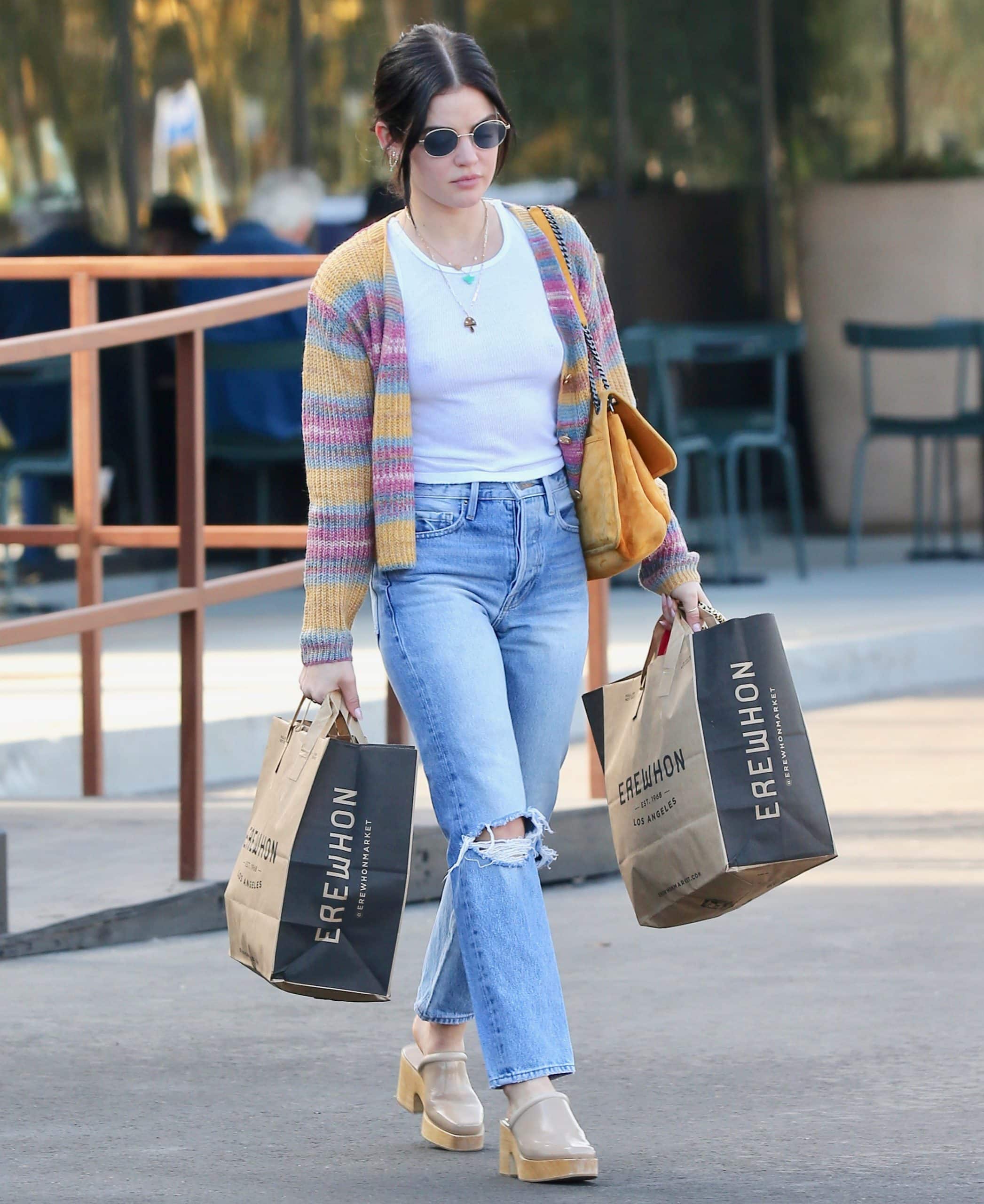 Lucy Hale goes braless while buying groceries at Erewhon Organic Grocers in Los Angeles on December 20, 2021