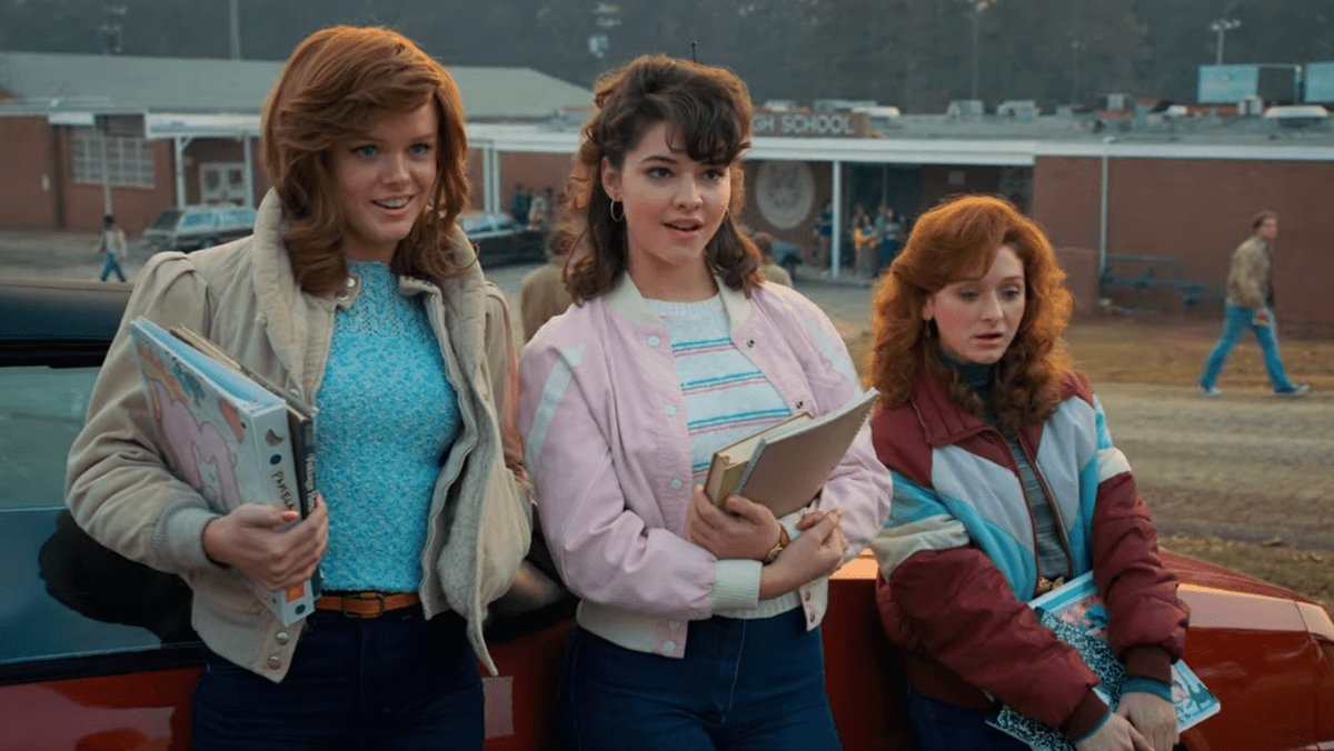 Abigail F. Cowen as Vicki Carmichael (L), Madelyn Cline as Tina (C), and Chelsea Talmadge as Carol in the Netflix original series Stranger Things