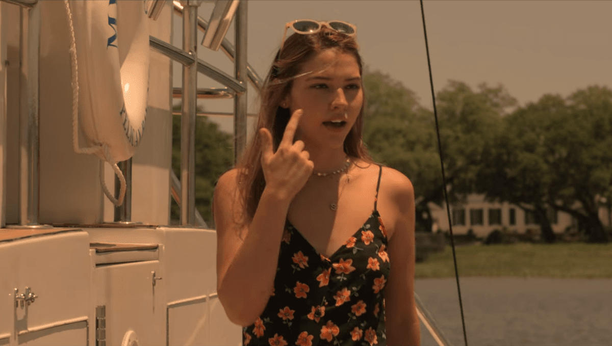 Madelyn Cline as Sarah Cameron in the American action-adventure mystery teen drama streaming television series Outer Banks