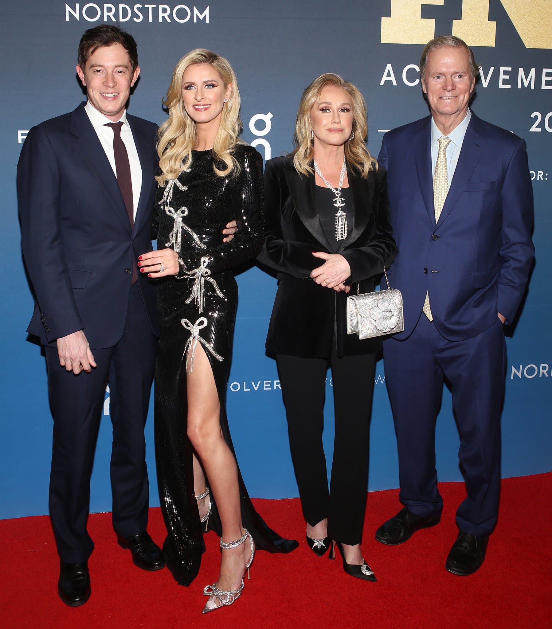 James Rothschild, Nicky Hilton, Kathy Hilton, and Richard Hilton at the 35th Annual FN Achievement Awards held at Cipriani South Street in New York City on November 30, 2021