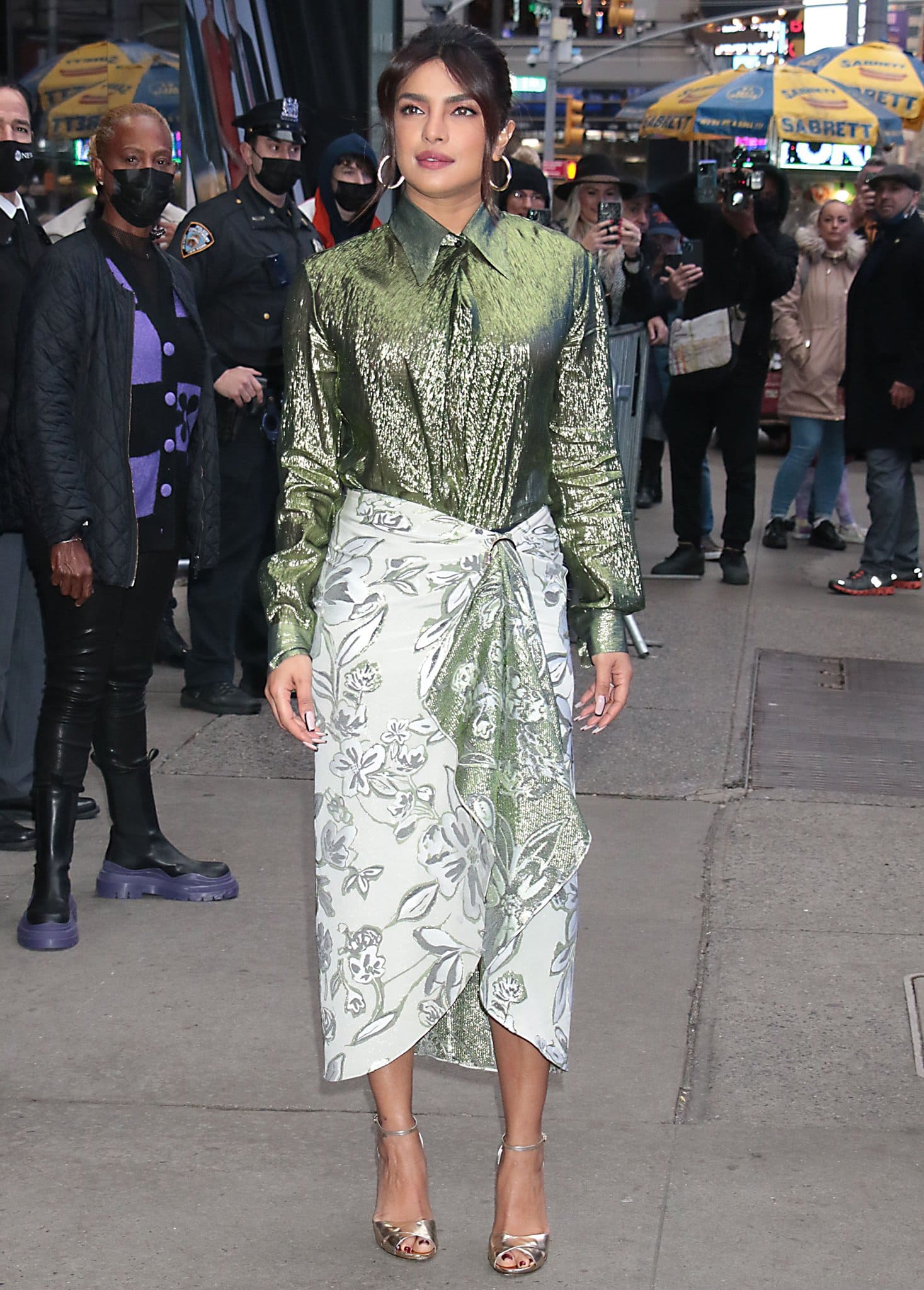 Priyanka Chopra visits Good Morning America in metallic green Peter Petrov shirt and Prabal Gurung wrap skirt