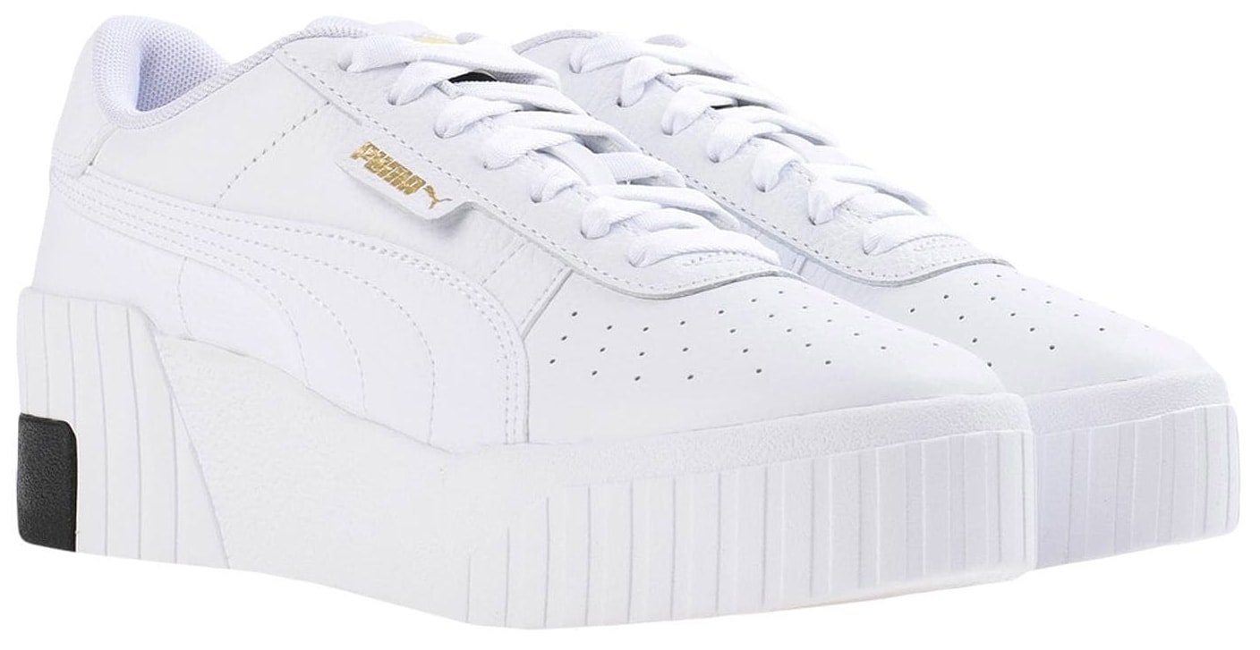The Puma Cali Wedge sneakers are a classic pair of white sneakers defined by the chunky platforms and heels