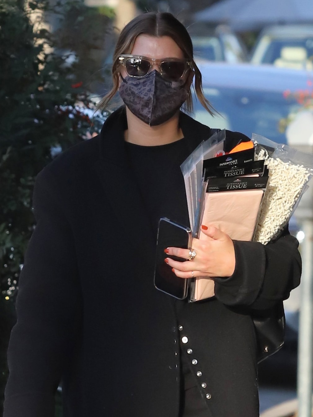 Sofia Richie keeps things low-key with Maskc cheetah-print face mask and Bottega Veneta sunnies